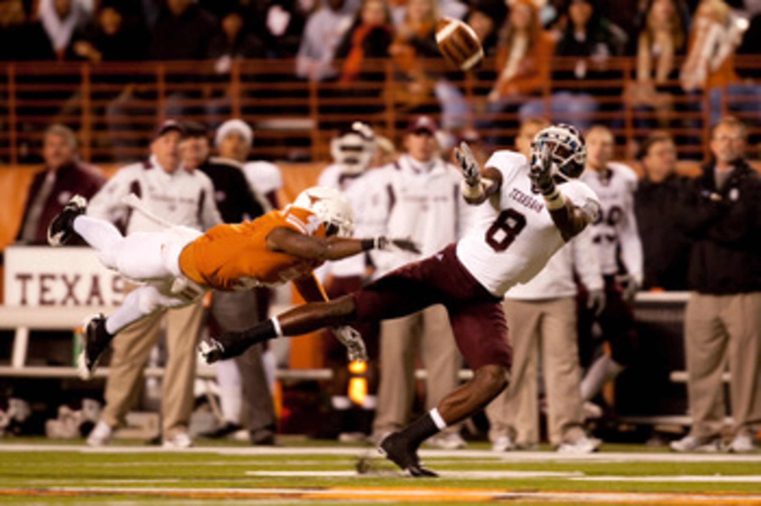 AUSTIN, TX - NOVEMBER 25: Texas A&M wide receiver Jeff Fuller #8 misses a catch as University of Texas cornerback Aaron Williams #4 defends during the first half at Darrell K. Royal-Texas Memorial Stadium on November 25, 2010 in Austin, Texas. (Photo by AUSTIN, TX - NOVEMBER 25: Texas A&M wide receiver Jeff Fuller #8 misses a catch as University of Texas cornerback Aaron Williams #4 defends during the first half at Darrell K. Royal-Texas Memorial Stadium on November 25, 2010 in Austin, Texas. (Photo by