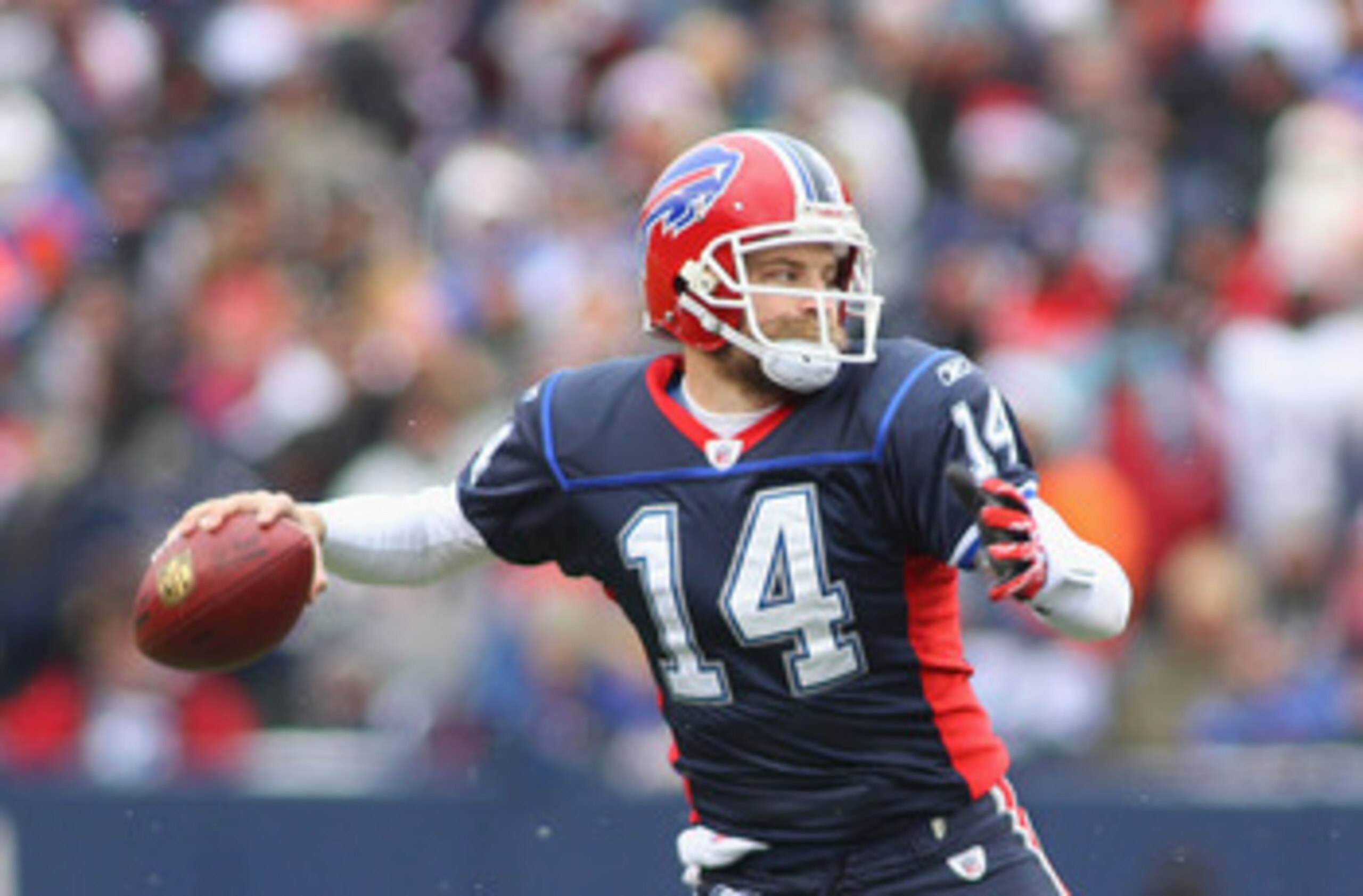 ORCHARD PARK, NY - DECEMBER 26:  Ryan Fitzpatrick #14 of the Buffalo Bills readies to pass against the New England Patriots at Ralph Wilson Stadium on December 26, 2010 in Orchard Park, New York.  (Photo by Rick Stewart/Getty Images)