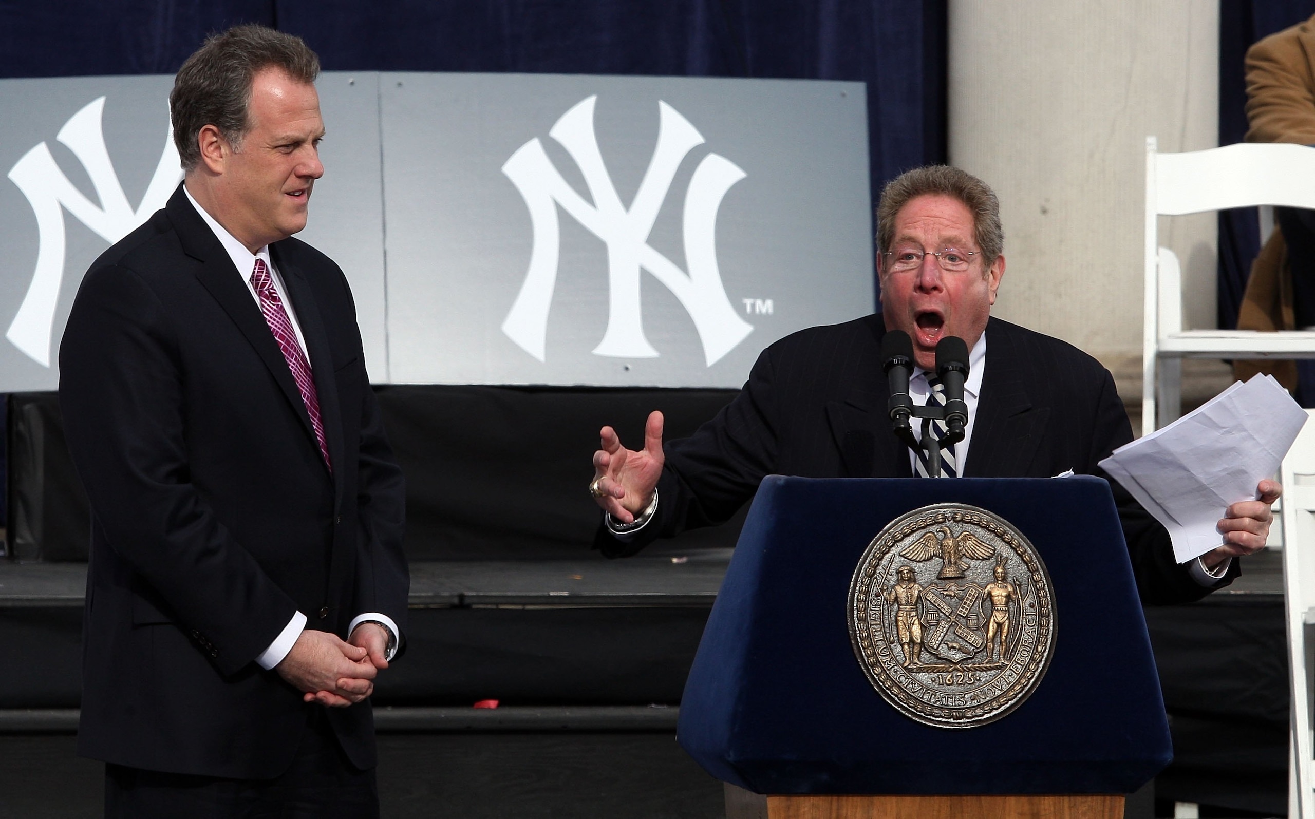 NEW YORK - NOVEMBER 06: New York Yankees broadcasters Michael Kay (L) and John Sterling speak during the New York Yankees World Series Victory Celebration at City Hall on November 6, 2009 in New York, New York.  (Photo by Jim McIsaac/Getty Images)