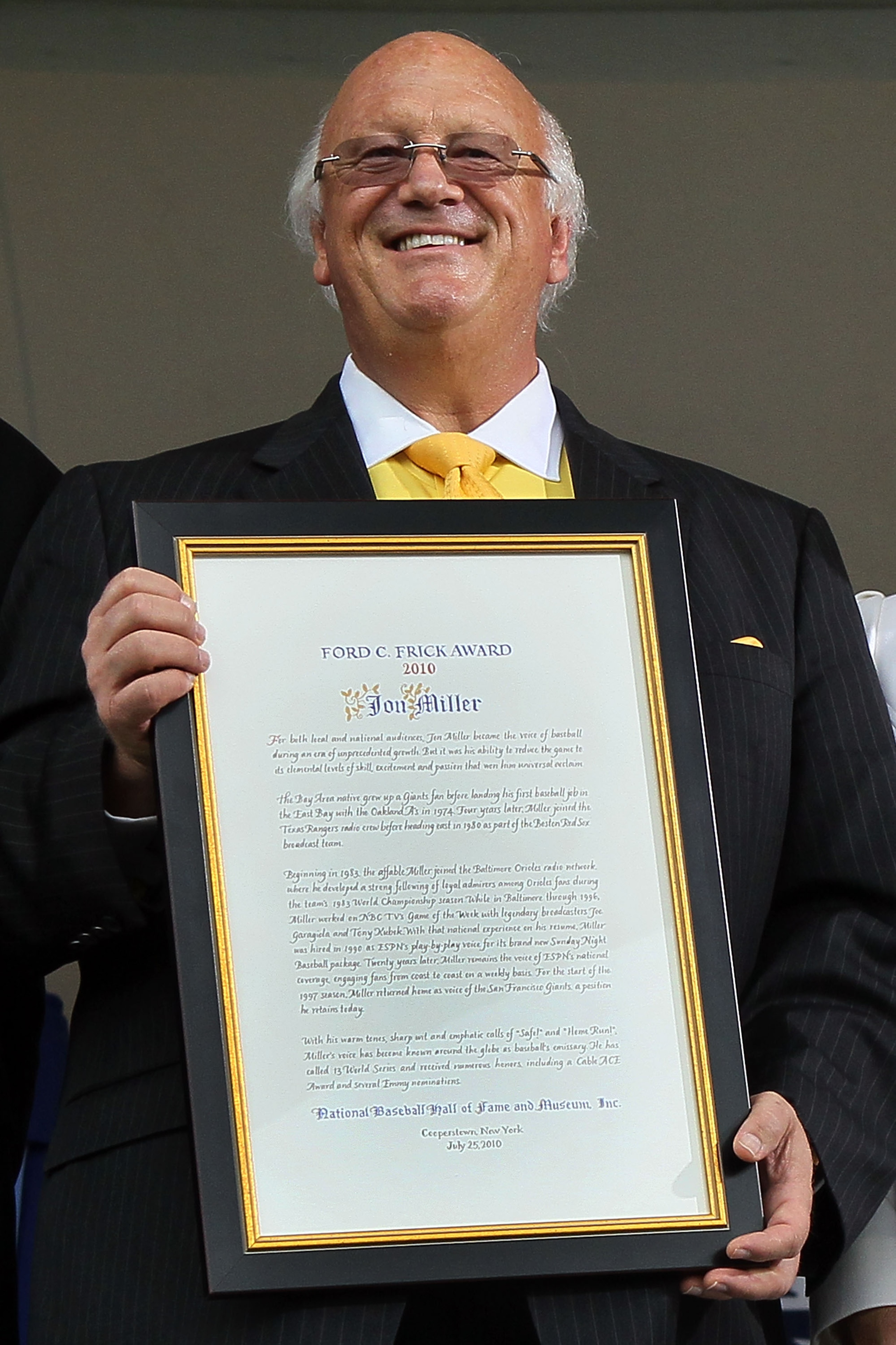 COOPERSTOWN, NY - JULY 25:  Jon Miller holds the Ford C. Frick award he received for contributions in baseball broadcasting at Clark Sports Center during the Baseball Hall of Fame induction ceremony on July 25, 20010 in Cooperstown, New York.  (Photo by J
