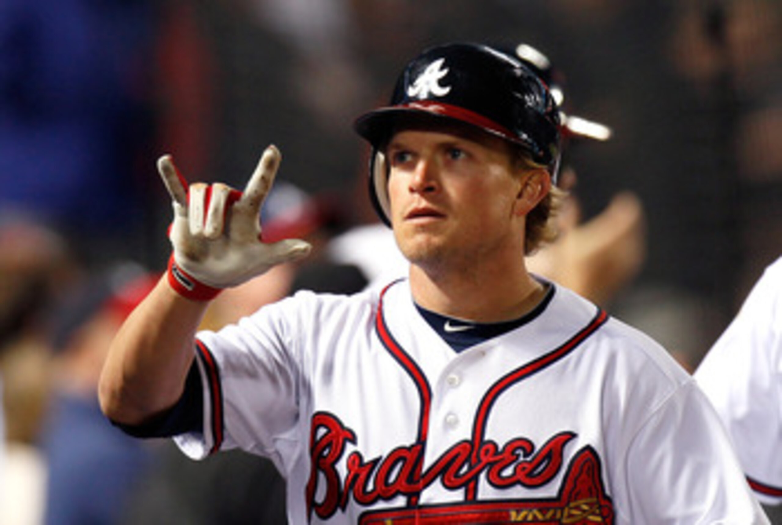 ATLANTA, GA - MAY 04:  Nate McLouth #13 of the Atlanta Braves reacts after hitting a two-run homer in the fourth inning against the Milwaukee Brewers at Turner Field on May 4, 2011 in Atlanta, Georgia.  (Photo by Kevin C. Cox/Getty Images)