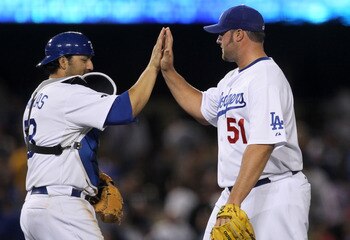 LOS ANGELES - MAY 2:  Closer Jonathan Broxton #51 and catcher Rod Barajas #28 of the Los Angeles Dodgers celebrate after the game with the Chicago Cubs  on May 2, 2011 at Dodger Stadium in Los Angeles, California. Broxton picked up the save as the Dodgers