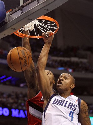 DALLAS, TX - DECEMBER 15: Forward Caron Butler #4 of the Dallas Mavericks makes a slam dunk against Dante Cunningham #33 of the Portland Trail Blazers at American Airlines Center on December 15, 2010 in Dallas, Texas. NOTE TO USER: User expressly acknow DALLAS, TX - DECEMBER 15: Forward Caron Butler #4 of the Dallas Mavericks makes a slam dunk against Dante Cunningham #33 of the Portland Trail Blazers at American Airlines Center on December 15, 2010 in Dallas, Texas. NOTE TO USER: User expressly acknow