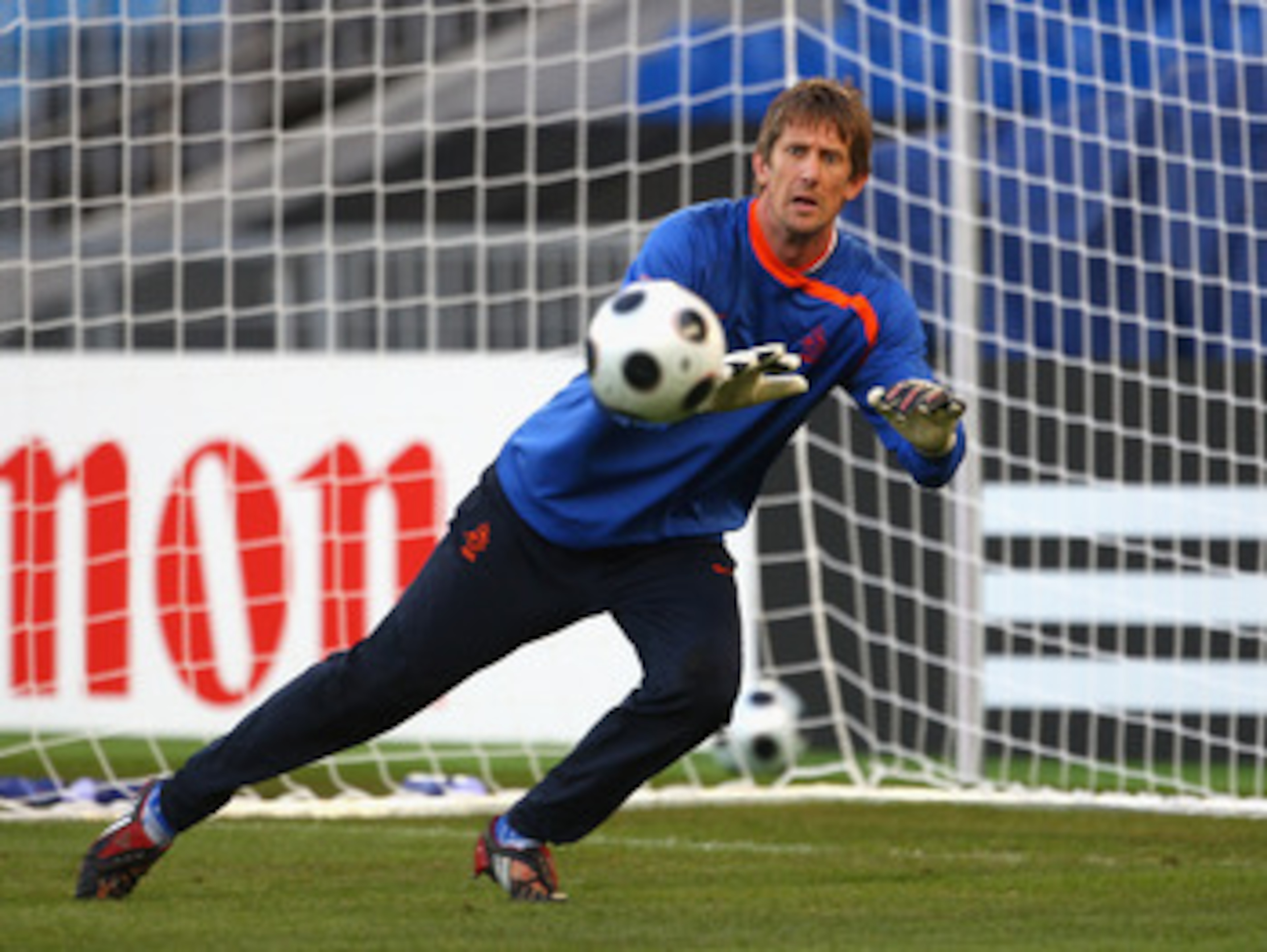 BASEL, SWITZERLAND - JUNE 20: Edwin van der Sar of The Netherlands makes a save during training ahead of the Euro 2008 Quarter Final at St Jacob Park on June 20, 2008 in Basel, Switzerland.  (Photo by Laurence Griffiths/Getty Images)