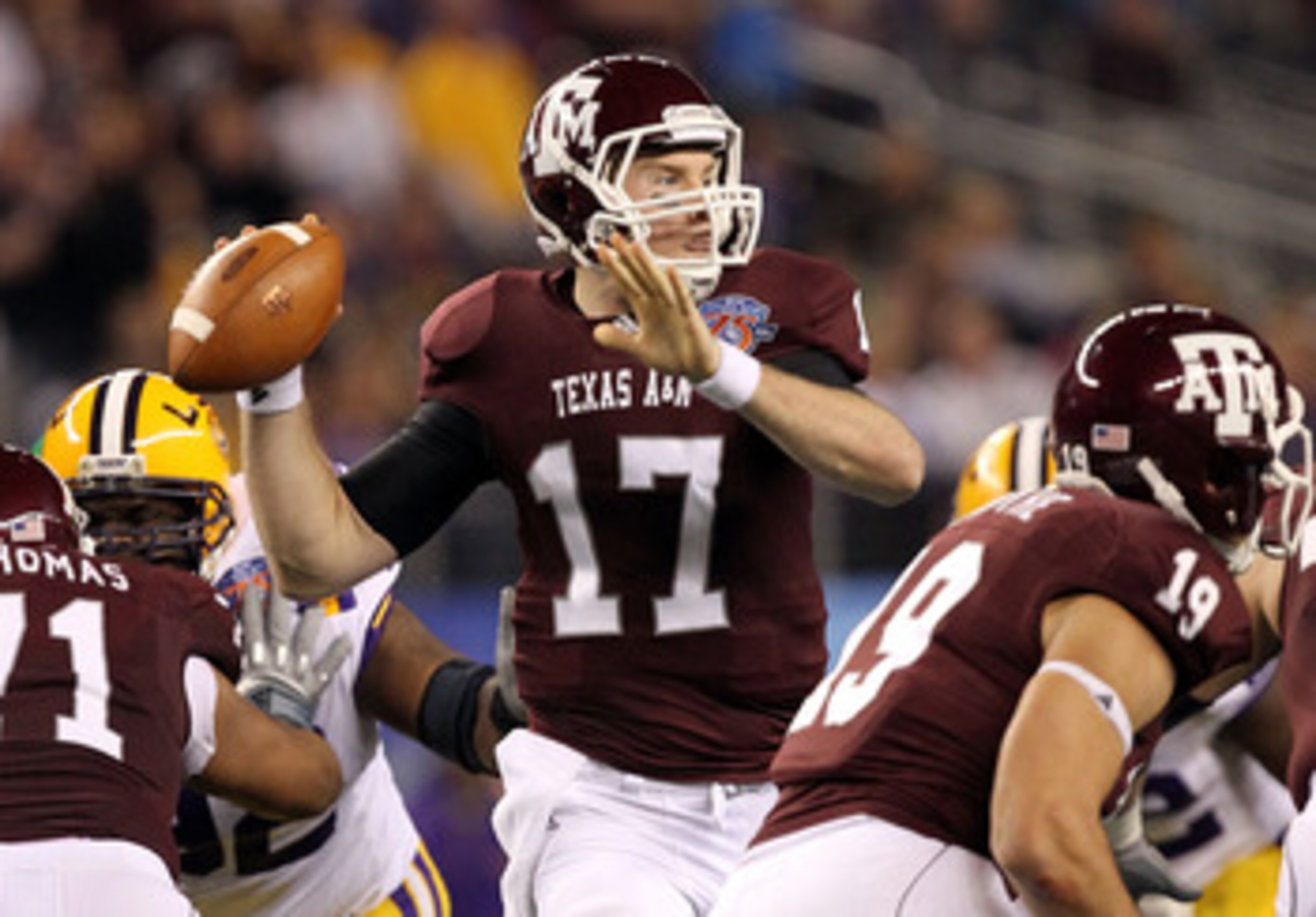 ARLINGTON, TX - JANUARY 07: Quarterback Ryan Tannehill #17 of the Texas A&M Aggies throws against the LSU Tigers during the AT&T Cotton Bowl at Cowboys Stadium on January 7, 2011 in Arlington, Texas. (Photo by Ronald Martinez/Getty Images) ARLINGTON, TX - JANUARY 07: Quarterback Ryan Tannehill #17 of the Texas A&M Aggies throws against the LSU Tigers during the AT&T Cotton Bowl at Cowboys Stadium on January 7, 2011 in Arlington, Texas. (Photo by Ronald Martinez/Getty Images)