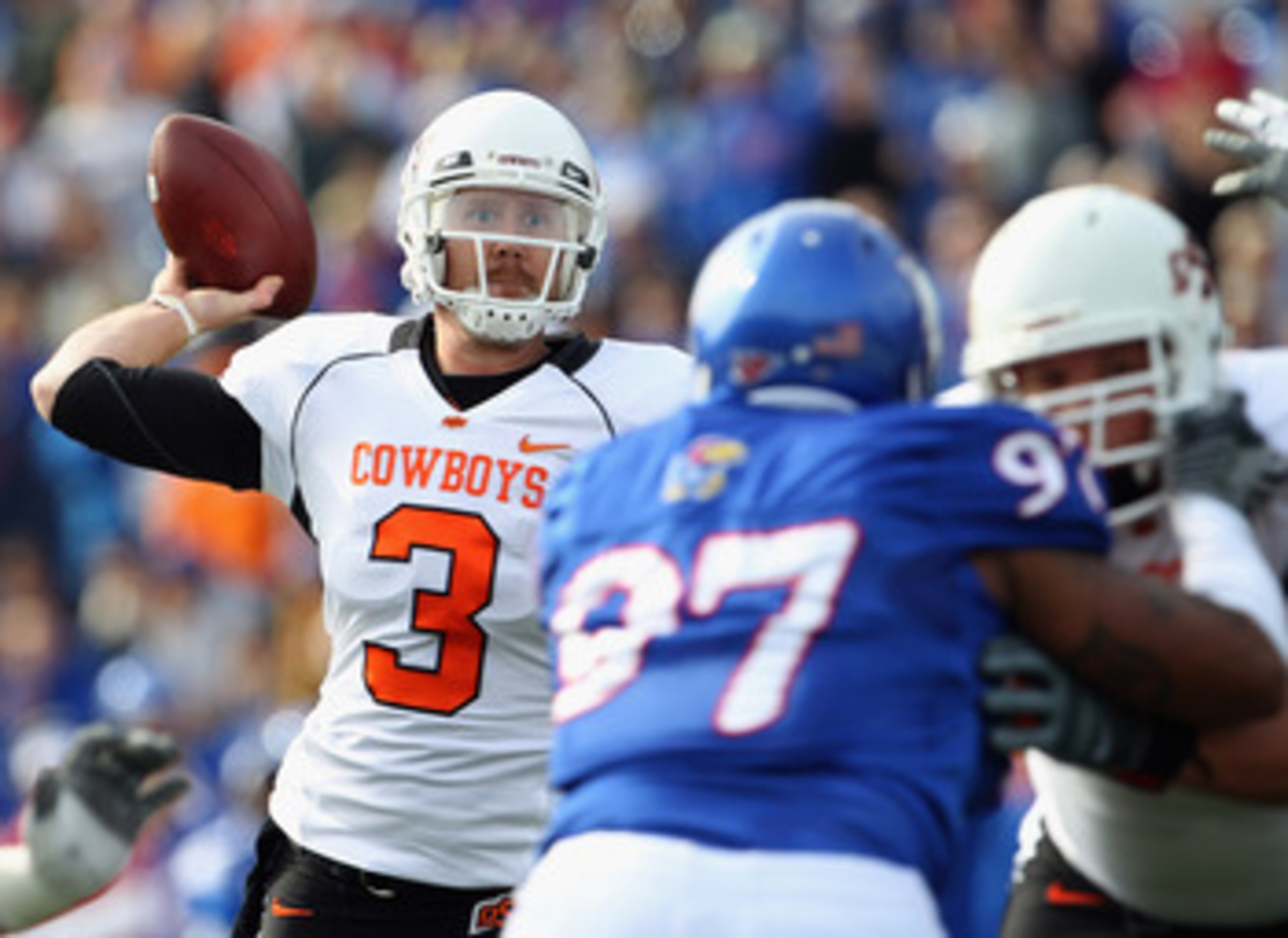 LAWRENCE, KS - NOVEMBER 20: Quarterback Brandon Weeden #3 of the Oklahoma State Cowboys passes during the game against the Kansas Jayhawks on November 20, 2010 at Memorial Stadium in Lawrence, Kansas. (Photo by Jamie Squire/Getty Images) LAWRENCE, KS - NOVEMBER 20: Quarterback Brandon Weeden #3 of the Oklahoma State Cowboys passes during the game against the Kansas Jayhawks on November 20, 2010 at Memorial Stadium in Lawrence, Kansas. (Photo by Jamie Squire/Getty Images)