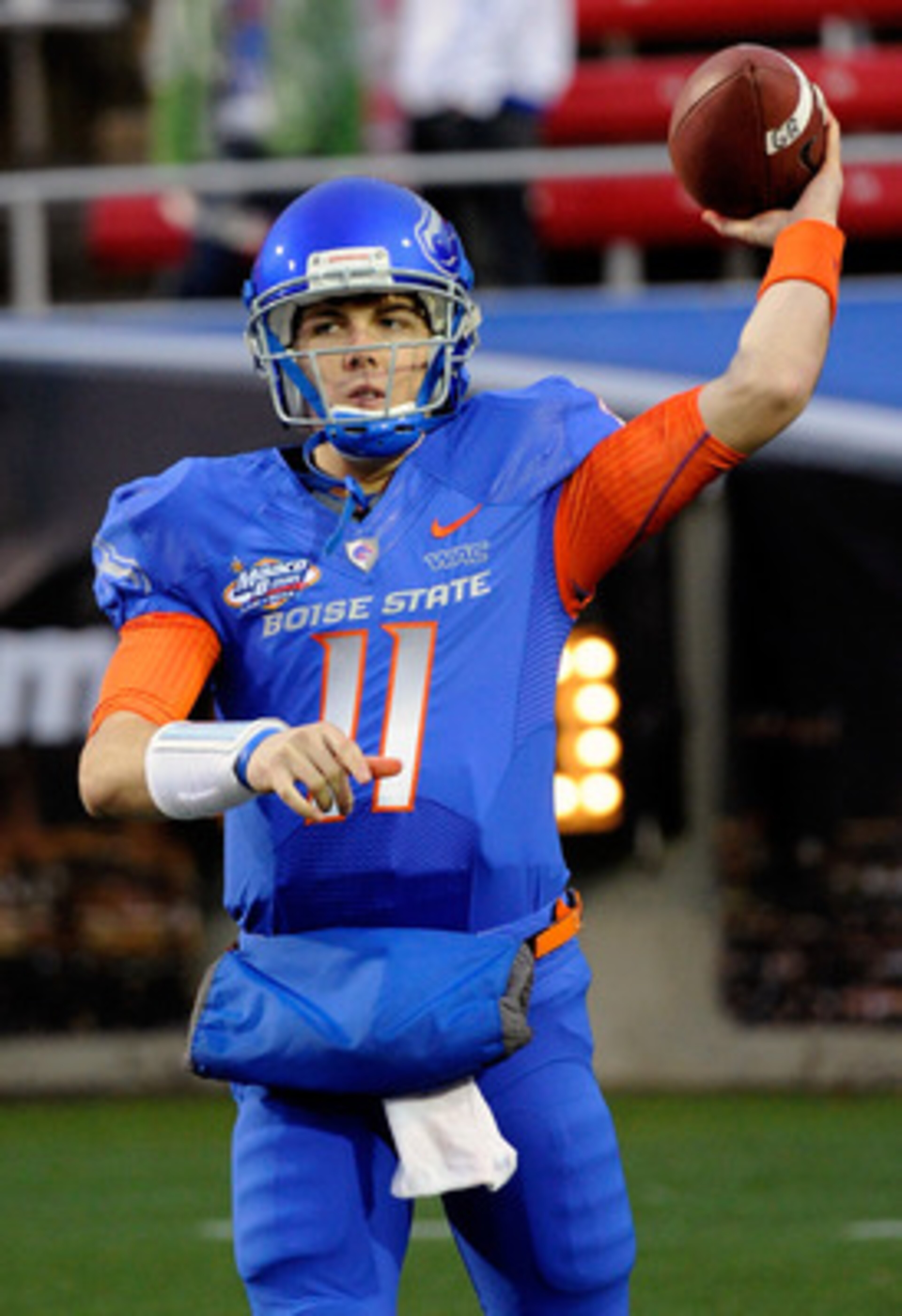 LAS VEGAS, NV - DECEMBER 22: Quarterback Kellen Moore #11 of the Boise State Broncos warms up before playing against the Utah Utes in the MAACO Bowl Las Vegas at Sam Boyd Stadium December 22, 2010 in Las Vegas, Nevada. Boise State Won 26-3. (Photo by Et LAS VEGAS, NV - DECEMBER 22: Quarterback Kellen Moore #11 of the Boise State Broncos warms up before playing against the Utah Utes in the MAACO Bowl Las Vegas at Sam Boyd Stadium December 22, 2010 in Las Vegas, Nevada. Boise State Won 26-3. (Photo by Et