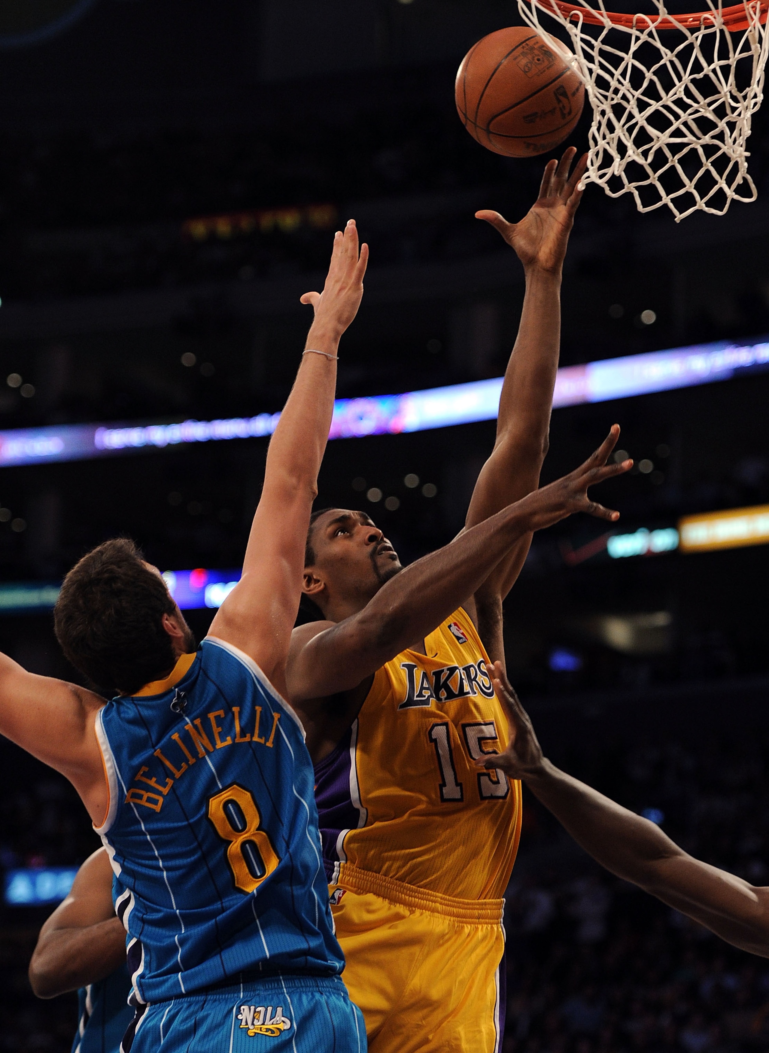 LOS ANGELES, CA - APRIL 20:  Ron Artest #15 of the Los Angeles Lakers shoots over Marco Belinelli #8 of the New Orleans Hornets in the first quarter in Game Two of the Western Conference Quarterfinals in the 2011 NBA Playoffs on April 20, 2011 at Staples 