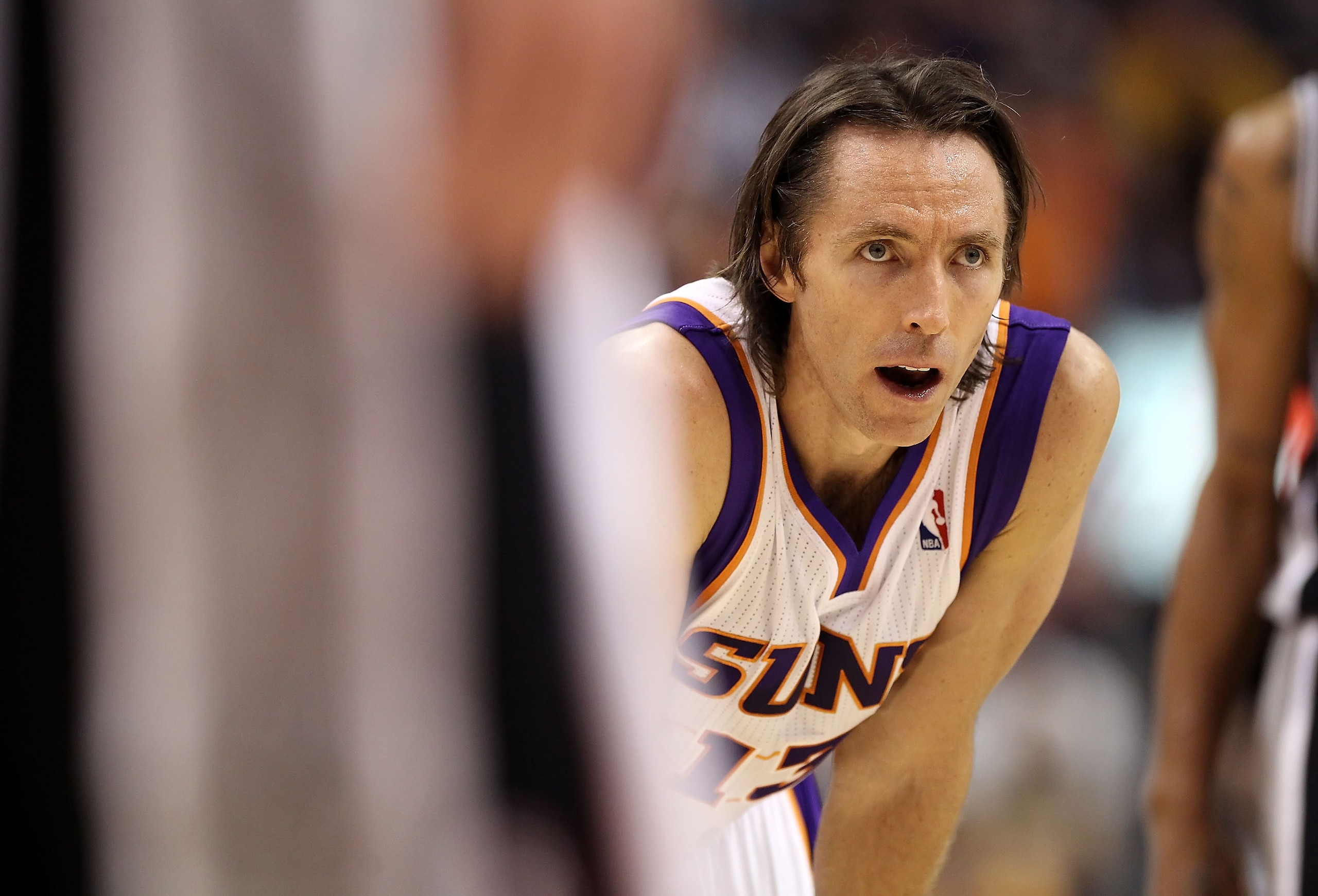 PHOENIX, AZ - APRIL 13:  Steve Nash #13 of the Phoenix Suns in action during the NBA game against the San Antonio Spurs at US Airways Center on April 13, 2011 in Phoenix, Arizona.  NOTE TO USER: User expressly acknowledges and agrees that, by downloading 