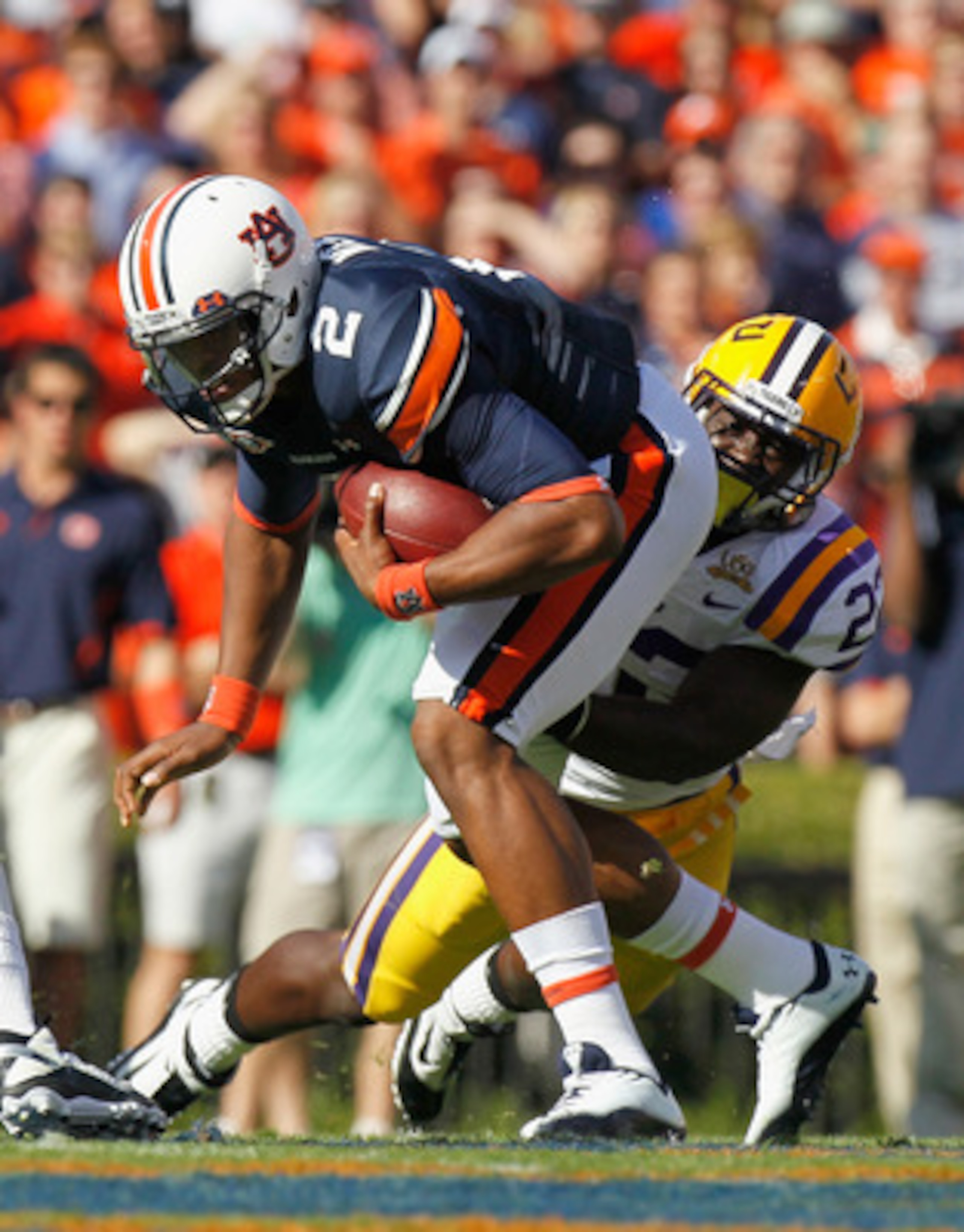 AUBURN, AL - OCTOBER 23:  Ryan Baker #22 of the LSU Tigers sacks quarterback Cameron Newton #2 of the Auburn Tigers at Jordan-Hare Stadium on October 23, 2010 in Auburn, Alabama.  (Photo by Kevin C. Cox/Getty Images)