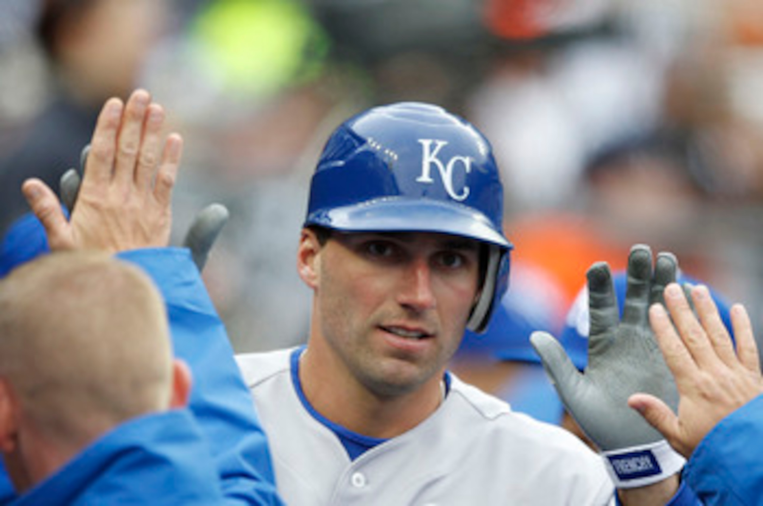 DETROIT - APRIL 09: Jeff Francoeur #21 of the Kansas City Royals is congratulated by his teammates after scoring in the second inning during the game against the Detroit Tigers at Comerica Park on April 9, 2011 in Detroit, Michigan.  (Photo by Leon Halip/