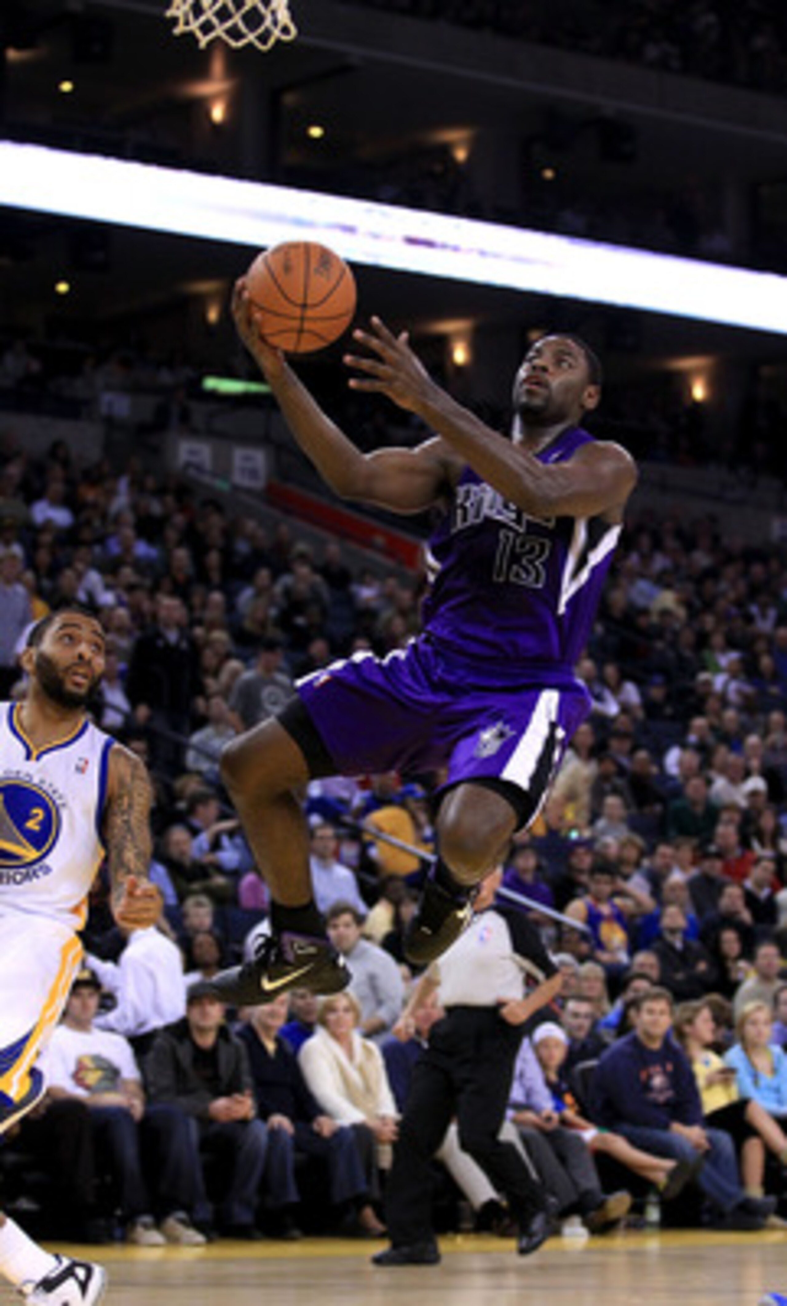 OAKLAND, CA - JANUARY 21:  Tyreke Evans #13 of the Sacramento Kings goes up for a shot against the Golden State Warriors at Oracle Arena on January 21, 2011 in Oakland, California. NOTE TO USER: User expressly acknowledges and agrees that, by downloading 