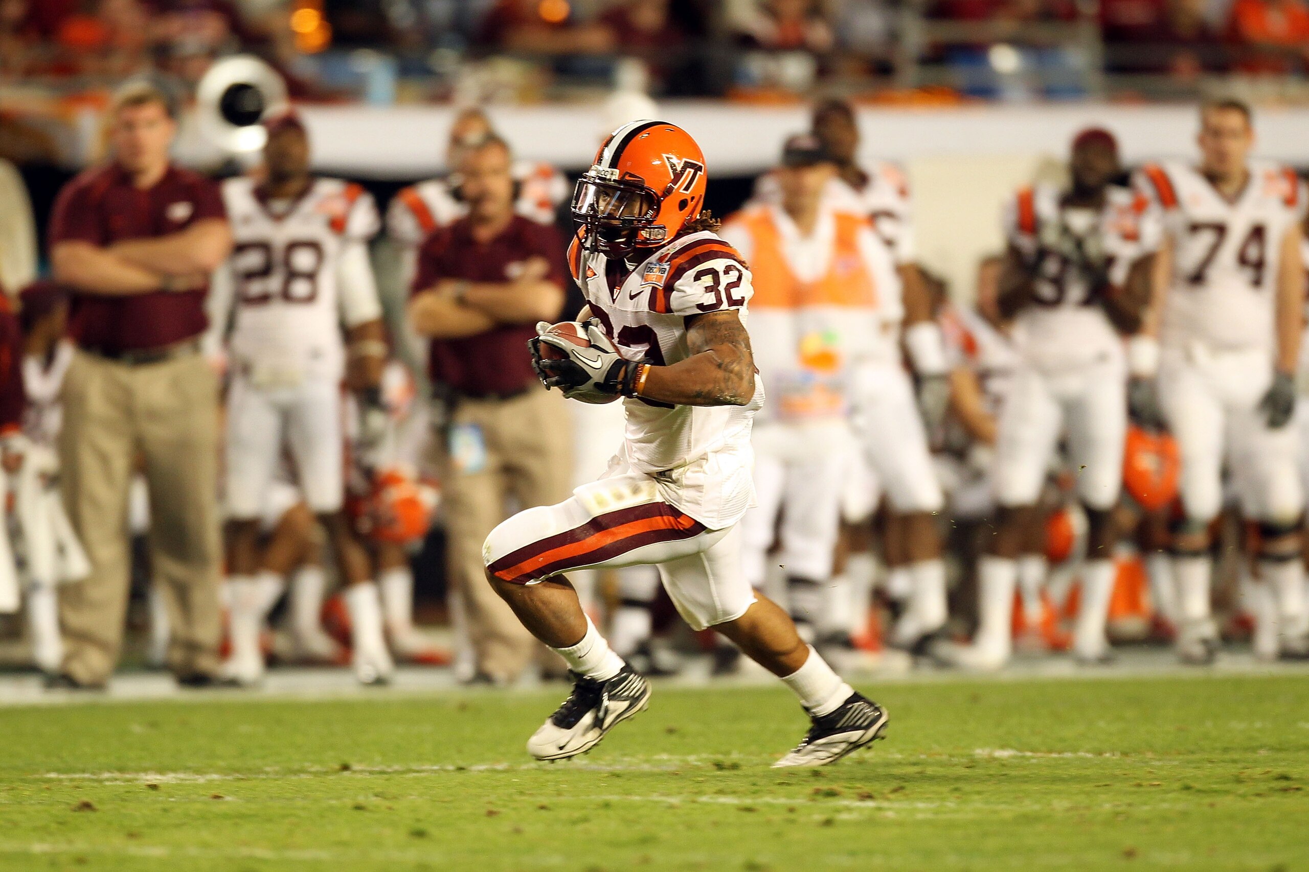 MIAMI, FL - JANUARY 03:  Darren Evans #32 of the Virginia Tech Hokies runs with the ball against the Stanford Cardinal during the 2011 Discover Orange Bowl at Sun Life Stadium on January 3, 2011 in Miami, Florida. Stanford won 40-12. (Photo by Mike Ehrman