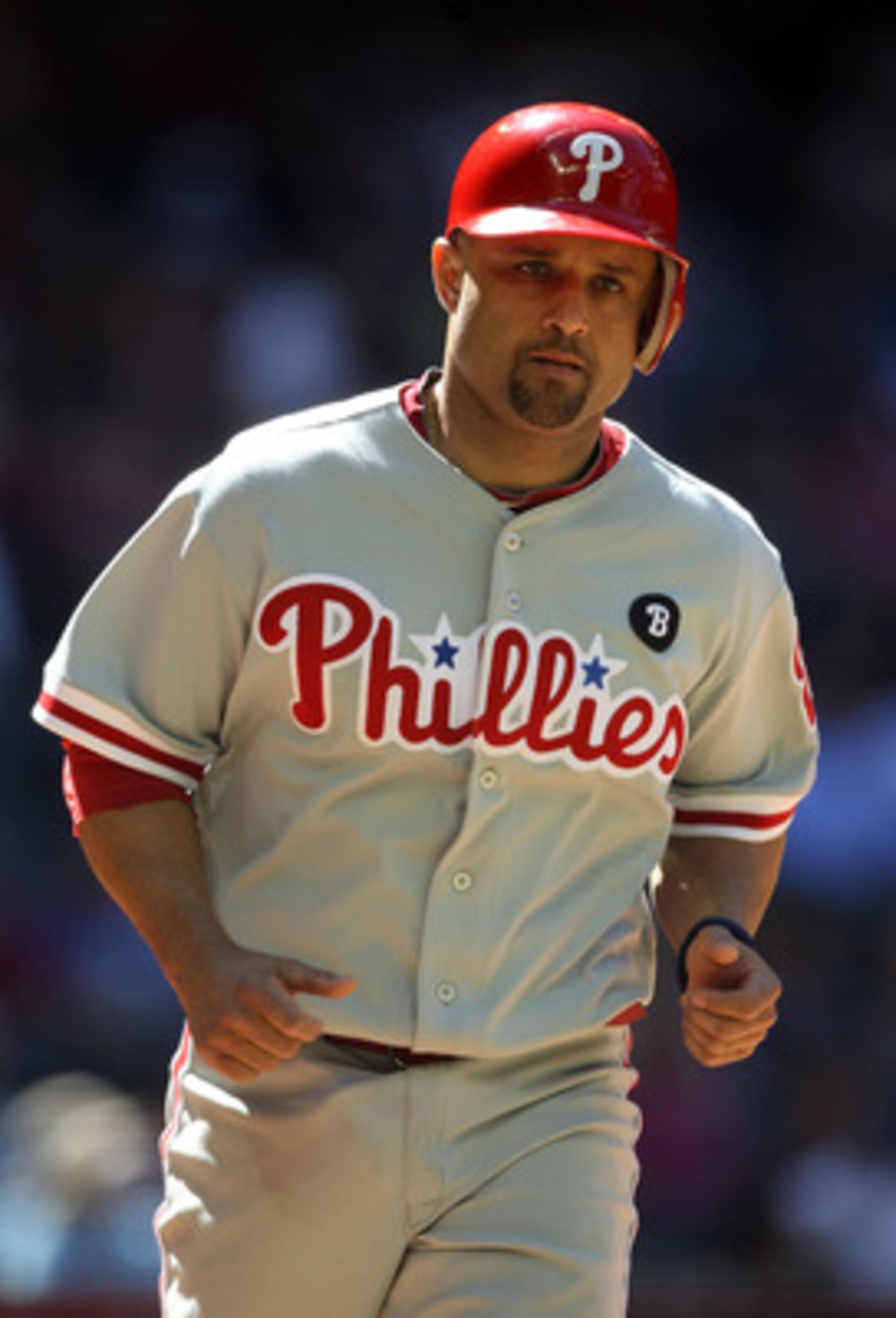 PHOENIX, AZ - APRIL 27:  Placido Polanco #27 of the Philadelphia Phillies scores a run against the Arizona Diamondbacks during the Major League Baseball game at Chase Field on April 27, 2011 in Phoenix, Arizona.  The Phillies defeated the Diamondbacks 8-4
