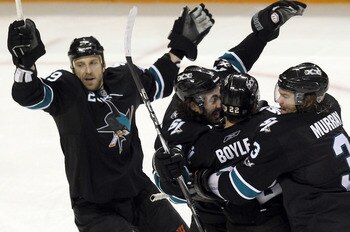 SAN JOSE, CA - APRIL 29:  Benn Ferriero #78 of the San Jose Sharks is congratulated by teammates after he scored the winning goal in overtime of their game against the Detroit Red Wings in Game One of the Western Conference Semifinals during the 2011 NHL