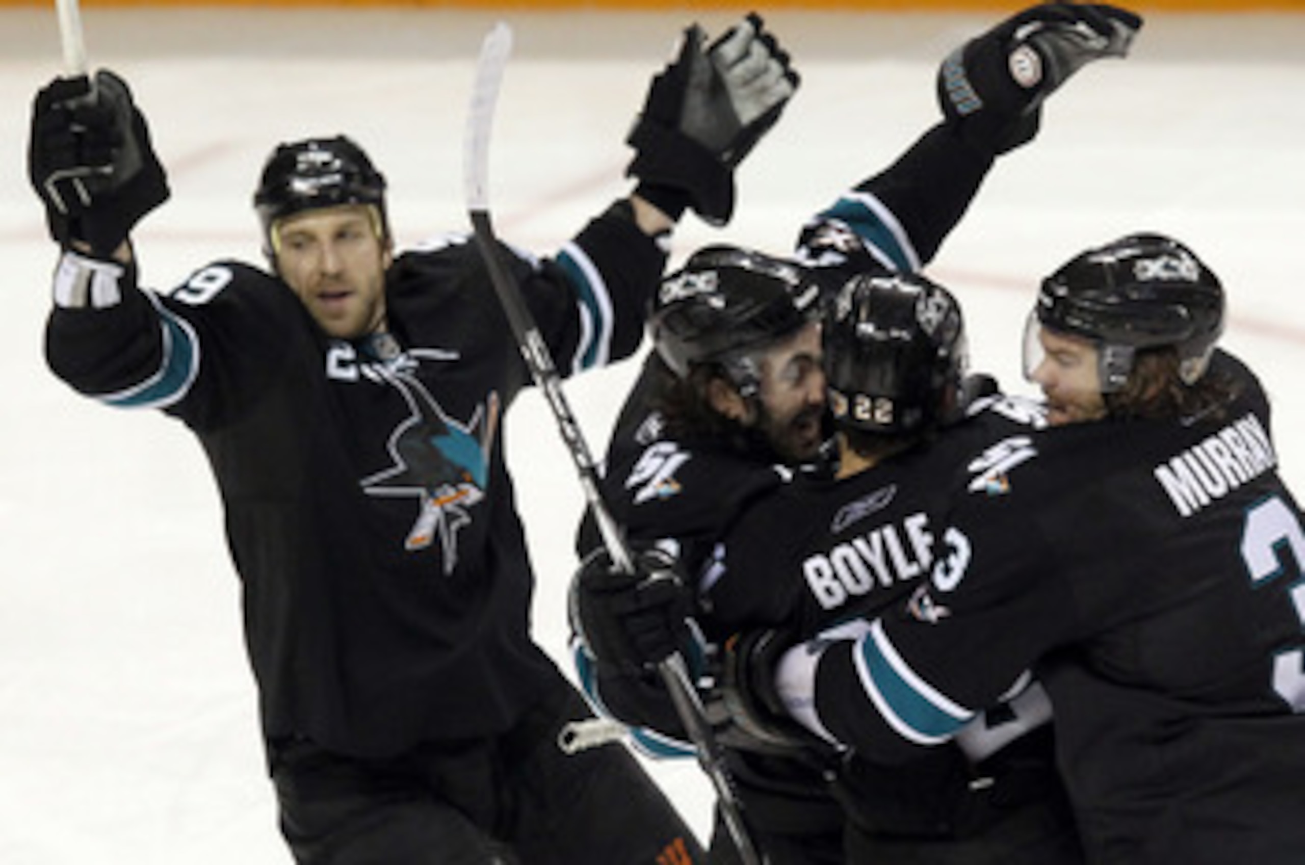 SAN JOSE, CA - APRIL 29:  Benn Ferriero #78 of the San Jose Sharks is congratulated by teammates after he scored the winning goal in overtime of their game against the Detroit Red Wings in Game One of the Western Conference Semifinals during the 2011 NHL