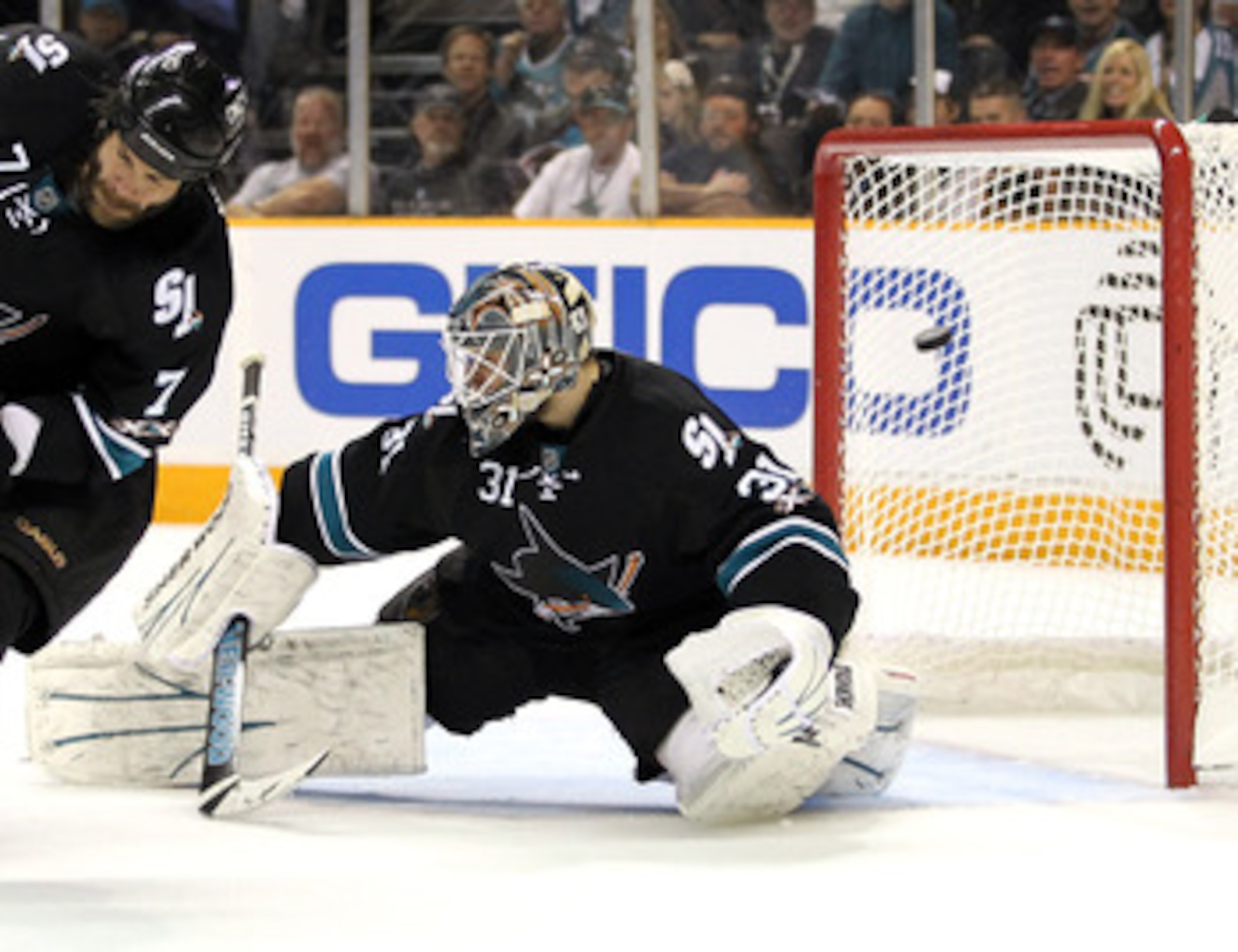 SAN JOSE, CA - MAY 08:  A shot taken by Niklas Kronwall #55 of the Detroit Red Wings gets past Antti Niemi #31 of the San Jose Sharks for a goal in Game Five of the Western Conference Semifinals during the 2011 NHL Stanley Cup Playoffs at HP Pavilion on M