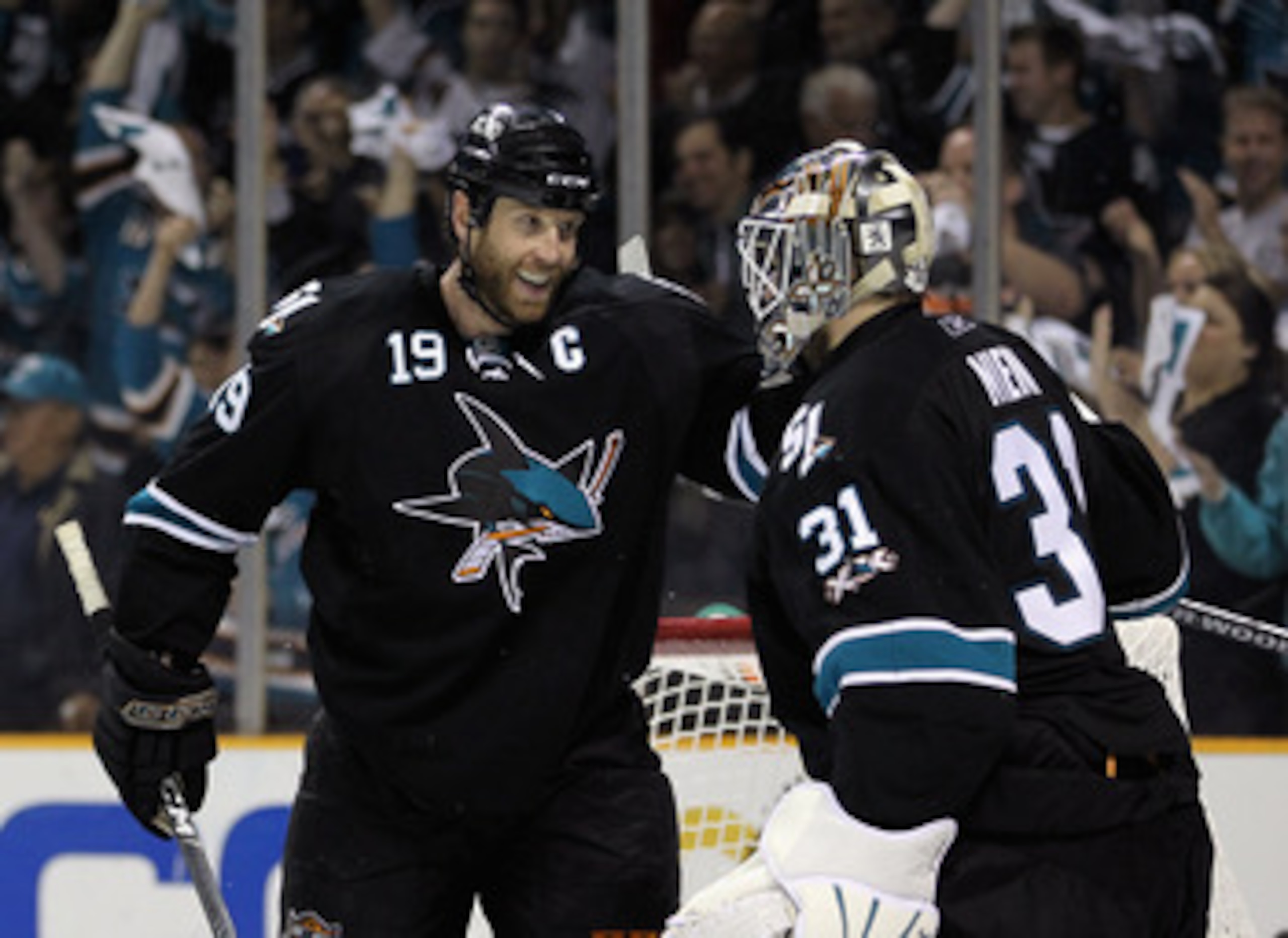 SAN JOSE, CA - MAY 01:  Joe Thornton #19 congratulates Antti Niemi #31 of the San Jose Sharks after they beat the Detroit Red Wings in Game Two of the Western Conference Semifinals during the 2011 NHL Stanley Cup Playoffs at HP Pavilion on May 1, 2011 in