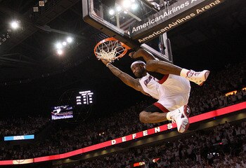 MIAMI, FL - MAY 11:  LeBron James #6 of the Miami Heat makes a late 4th quarter dunk during Game Five of the Eastern Conference Semifinals of the 2011 NBA Playoffs against the Boston Celtics at American Airlines Arena on May 11, 2011 in Miami, Florida. NO