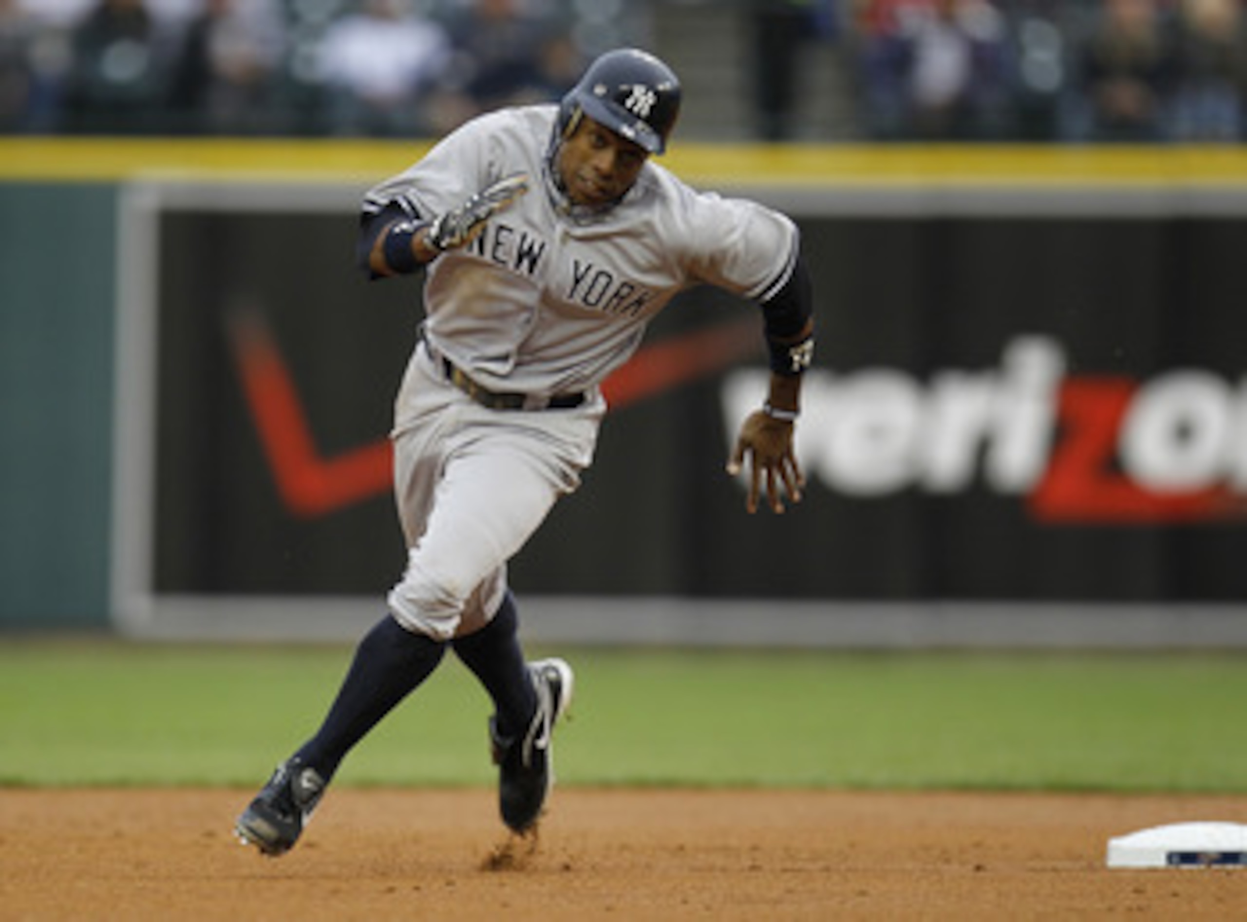 DETROIT, MI - MAY 02:  Curtis Granderson #14 of the New York Yankees runs to third base while playing the Detroit Tigers at Comerica Park on May 2, 2011 in Detroit, Michigan.  (Photo by Gregory Shamus/Getty Images)