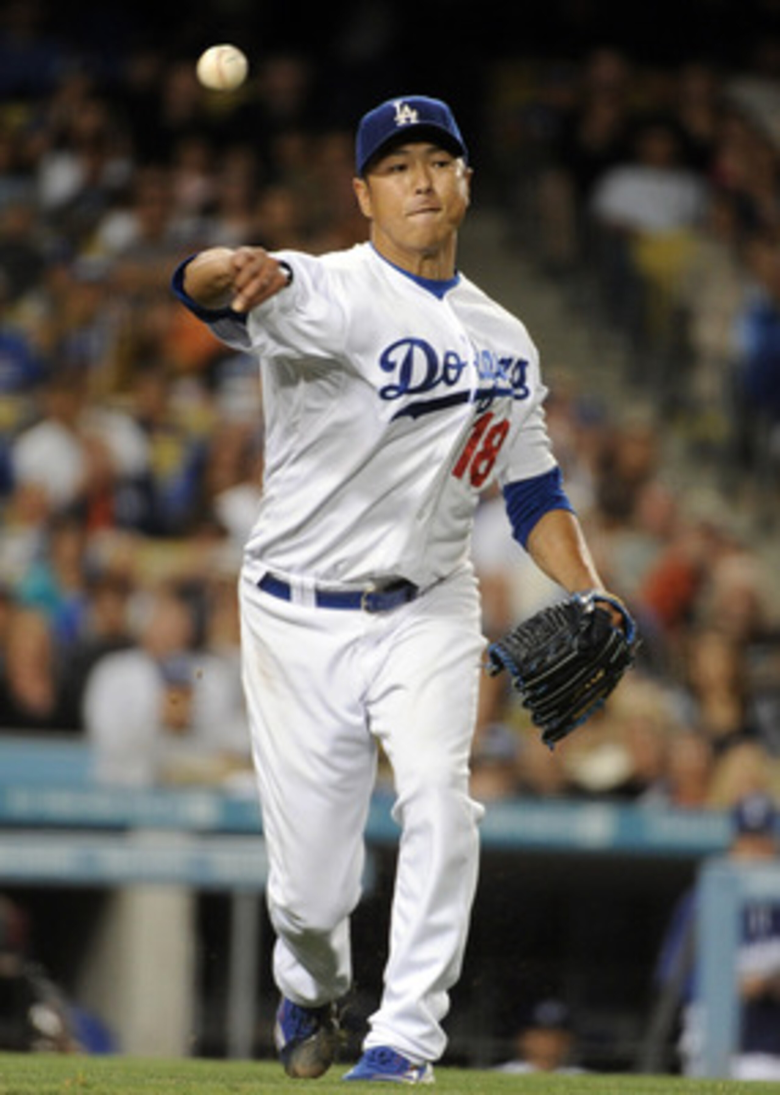 LOS ANGELES, CA - APRIL 30:  Hiroki Kuroda #18 of the Los Angeles Dodgers throws out Orlando Hudson #1 of the San Diego Padres during the sixth inning at Dodger Stadium on April 30, 2011 in Los Angeles, California.  (Photo by Harry How/Getty Images)