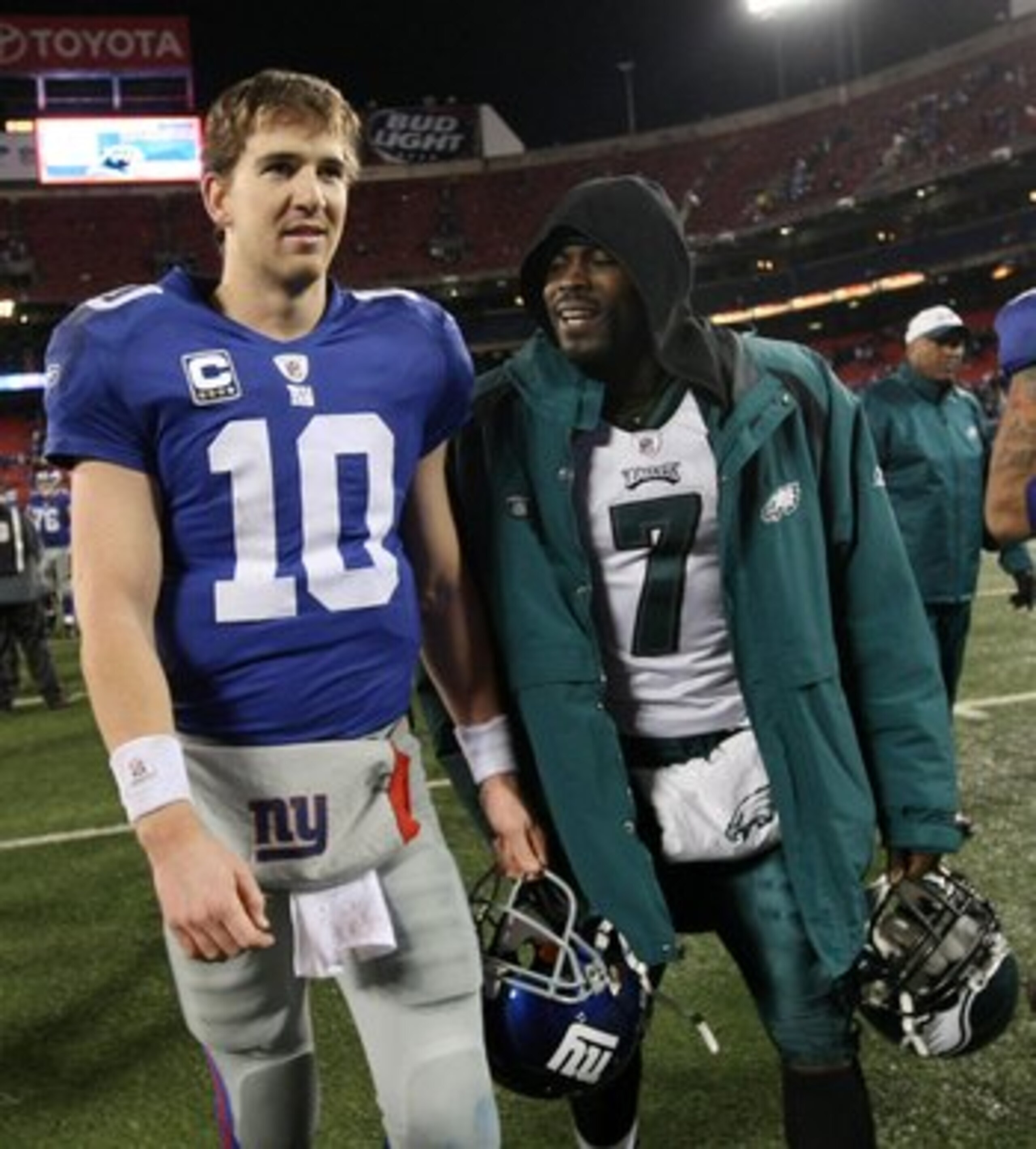 EAST RUTHERFORD, NJ - DECEMBER 13: Eli Manning #10 of the New York Giants walks off the field with Michael Vick #7 of the Philadelphia Eagles at Giants Stadium on December 13, 2009 in East Rutherford, New Jersey. (Photo by Nick Laham/Getty Images) EAST RUTHERFORD, NJ - DECEMBER 13: Eli Manning #10 of the New York Giants walks off the field with Michael Vick #7 of the Philadelphia Eagles at Giants Stadium on December 13, 2009 in East Rutherford, New Jersey. (Photo by Nick Laham/Getty Images)