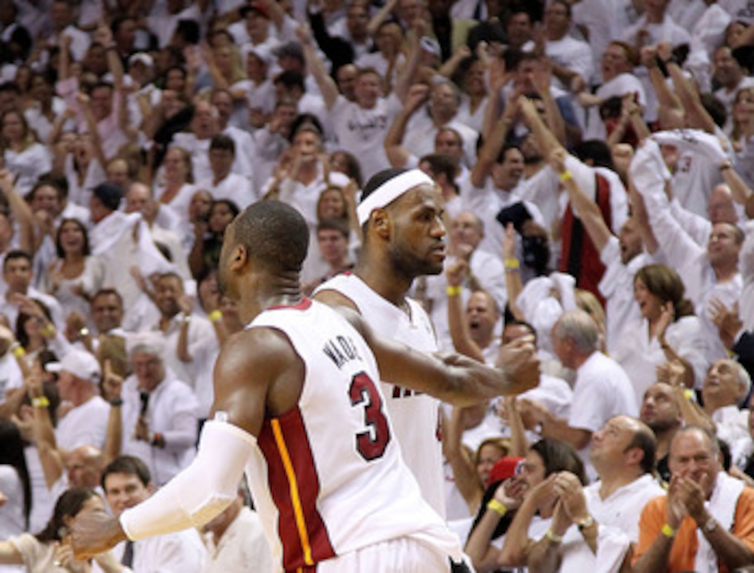 MIAMI, FL - MAY 11: LeBron James #6 of the Miami Heat is congratulated by Dwyane Wade #3 during Game Five of the Eastern Conference Semifinals of the 2011 NBA Playoffs against the Boston Celtics at American Airlines Arena on May 11, 2011 in Miami, Florid MIAMI, FL - MAY 11: LeBron James #6 of the Miami Heat is congratulated by Dwyane Wade #3 during Game Five of the Eastern Conference Semifinals of the 2011 NBA Playoffs against the Boston Celtics at American Airlines Arena on May 11, 2011 in Miami, Florid
