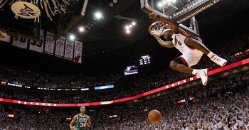 MIAMI, FL - MAY 11:  LeBron James #6 of the Miami Heat makes a late 4th quarter dunk during Game Five of the Eastern Conference Semifinals of the 2011 NBA Playoffs against the Boston Celtics at American Airlines Arena on May 11, 2011 in Miami, Florida. NO