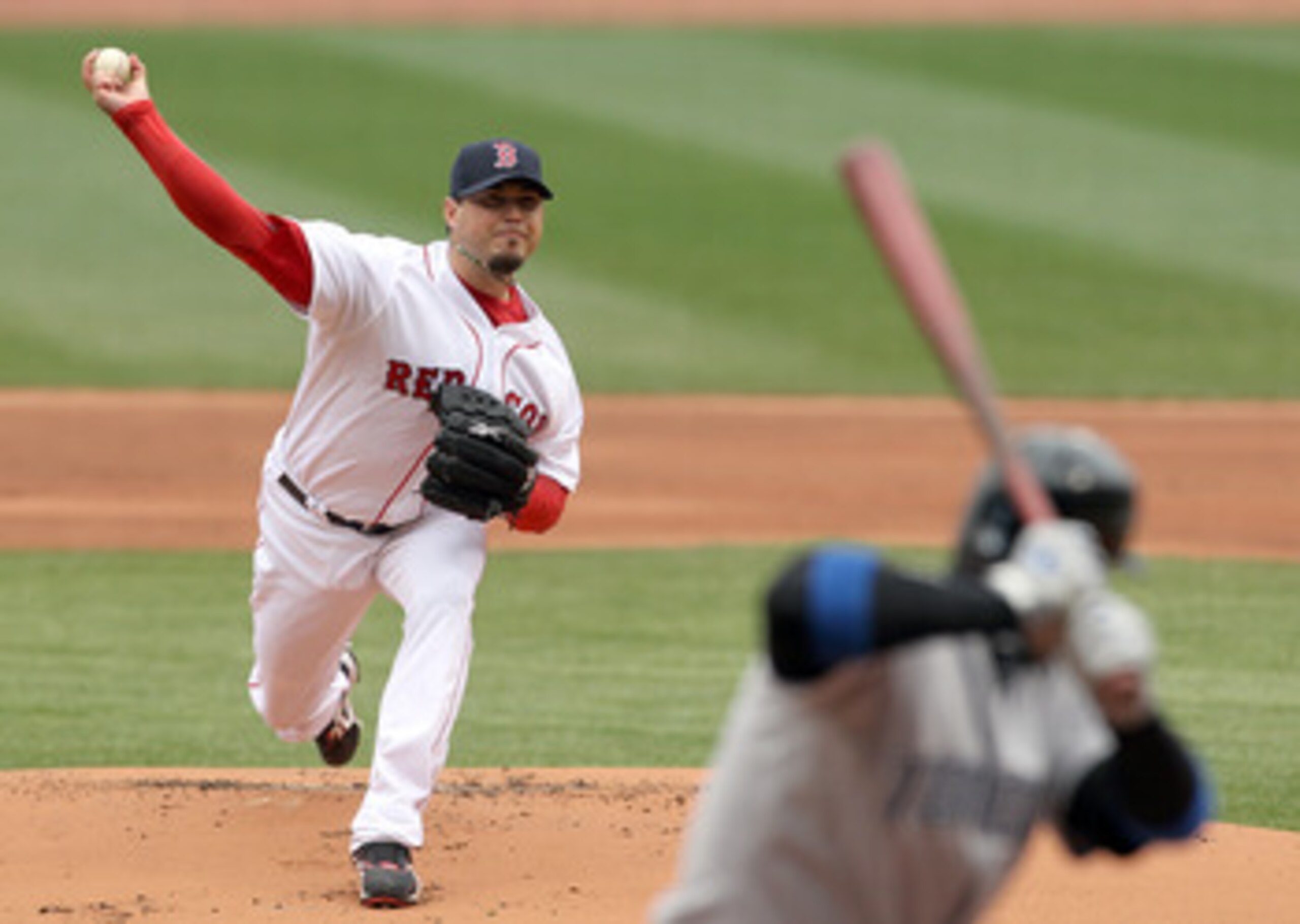 BOSTON, MA - APRIL 16, 2011:  Josh Beckett #19 of the Boston Red Sox throws against the Toronto Blue Jays at Fenway Park April 16, 2011 in Boston, Massachusetts. (Photo by Jim Rogash/Getty Images)