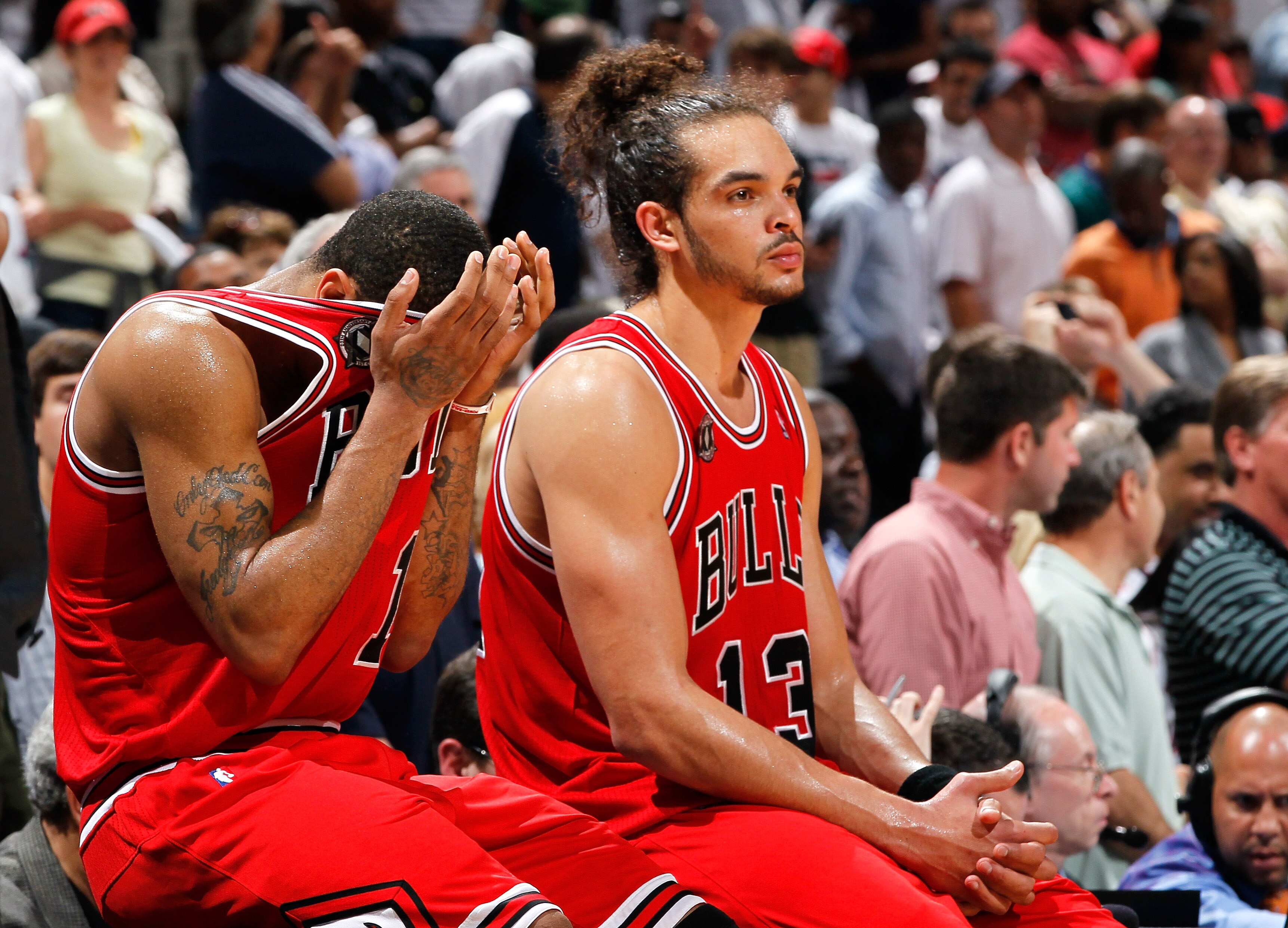 ATLANTA, GA - MAY 08:  Derrick Rose #1 and Joakim Noah #13 of the Chicago Bulls react as they wait to come back in after a timeout against the Atlanta Hawks in the final minutes of their 100-88 loss in Game Four of the Eastern Conference Semifinals in the