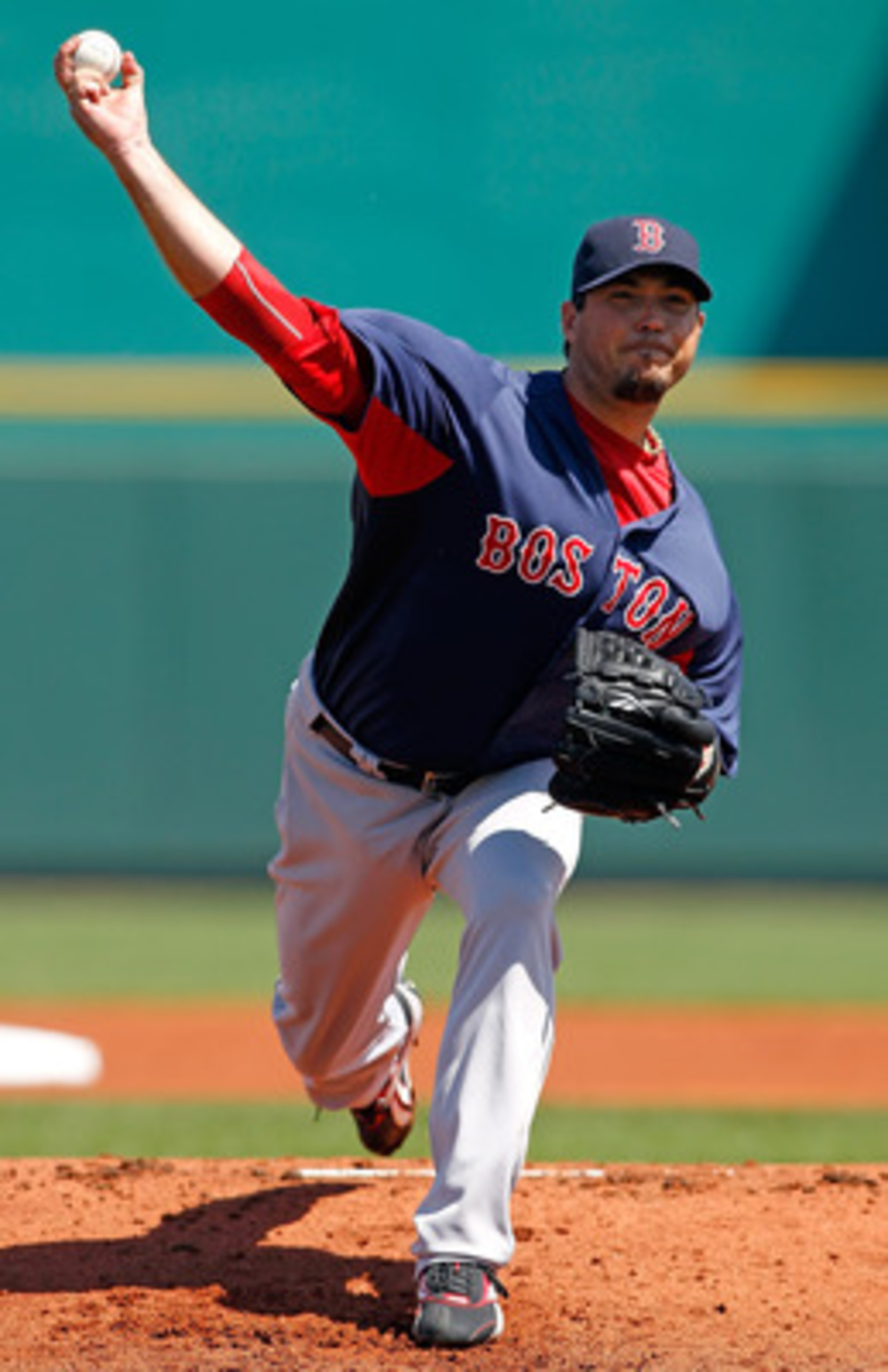 BRADENTON, FL - MARCH 13:  Pitcher Josh Beckett #19 of the Boston Red Sox pitches against the Pittsburgh Pirates during a Grapefruit League Spring Training Game at McKechnie Field on March 13, 2011 in Bradenton, Florida.  (Photo by J. Meric/Getty Images)