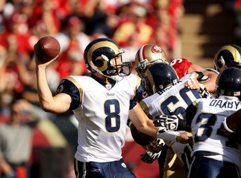 SAN FRANCISCO - NOVEMBER 14:  Sam Bradford #8  of the St. Louis Rams in action against the San Francisco 49ers at Candlestick Park on November 14, 2010 in San Francisco, California.  (Photo by Ezra Shaw/Getty Images)