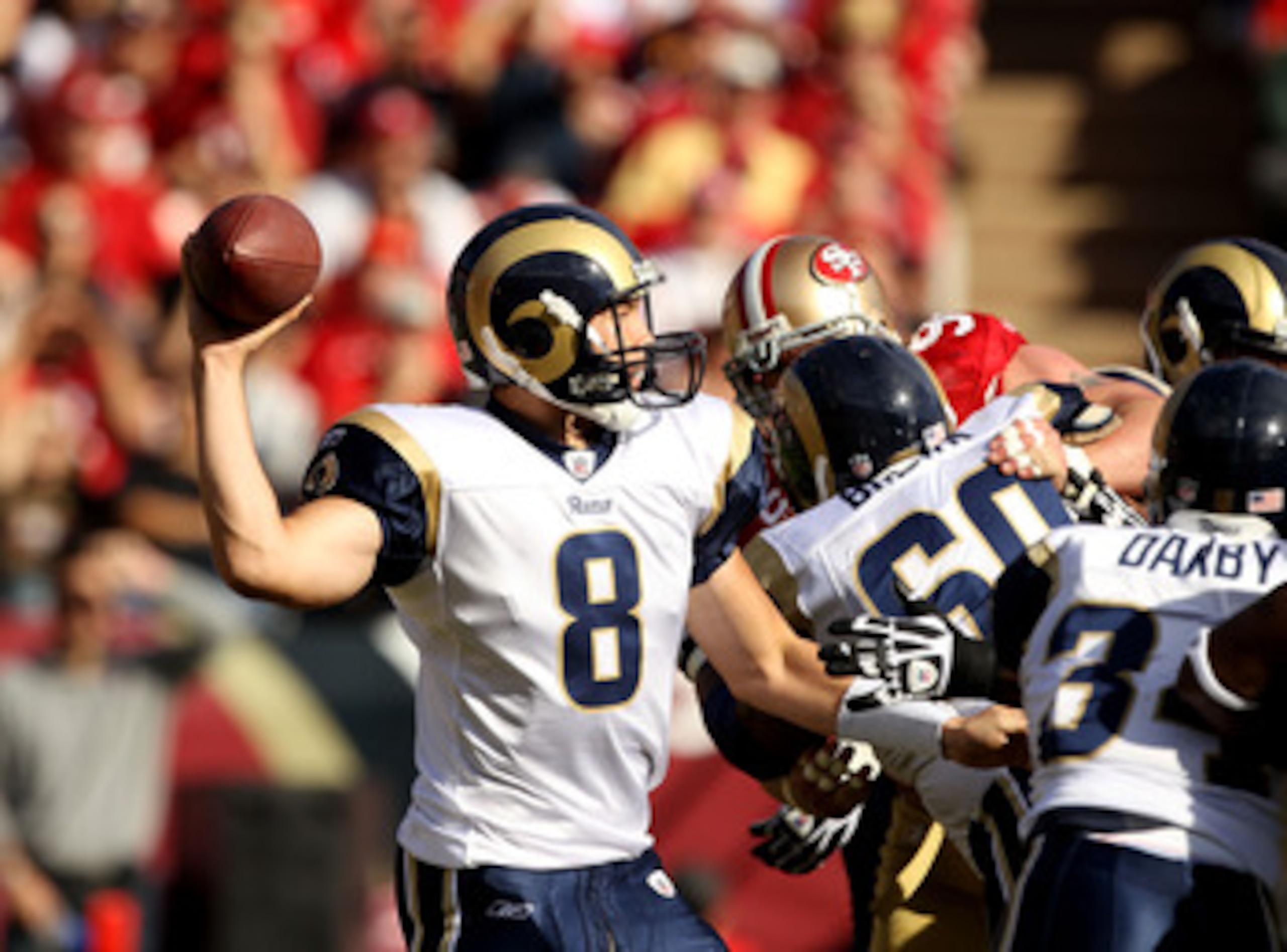 SAN FRANCISCO - NOVEMBER 14: Sam Bradford #8 of the St. Louis Rams in action against the San Francisco 49ers at Candlestick Park on November 14, 2010 in San Francisco, California. (Photo by Ezra Shaw/Getty Images) SAN FRANCISCO - NOVEMBER 14: Sam Bradford #8 of the St. Louis Rams in action against the San Francisco 49ers at Candlestick Park on November 14, 2010 in San Francisco, California. (Photo by Ezra Shaw/Getty Images)