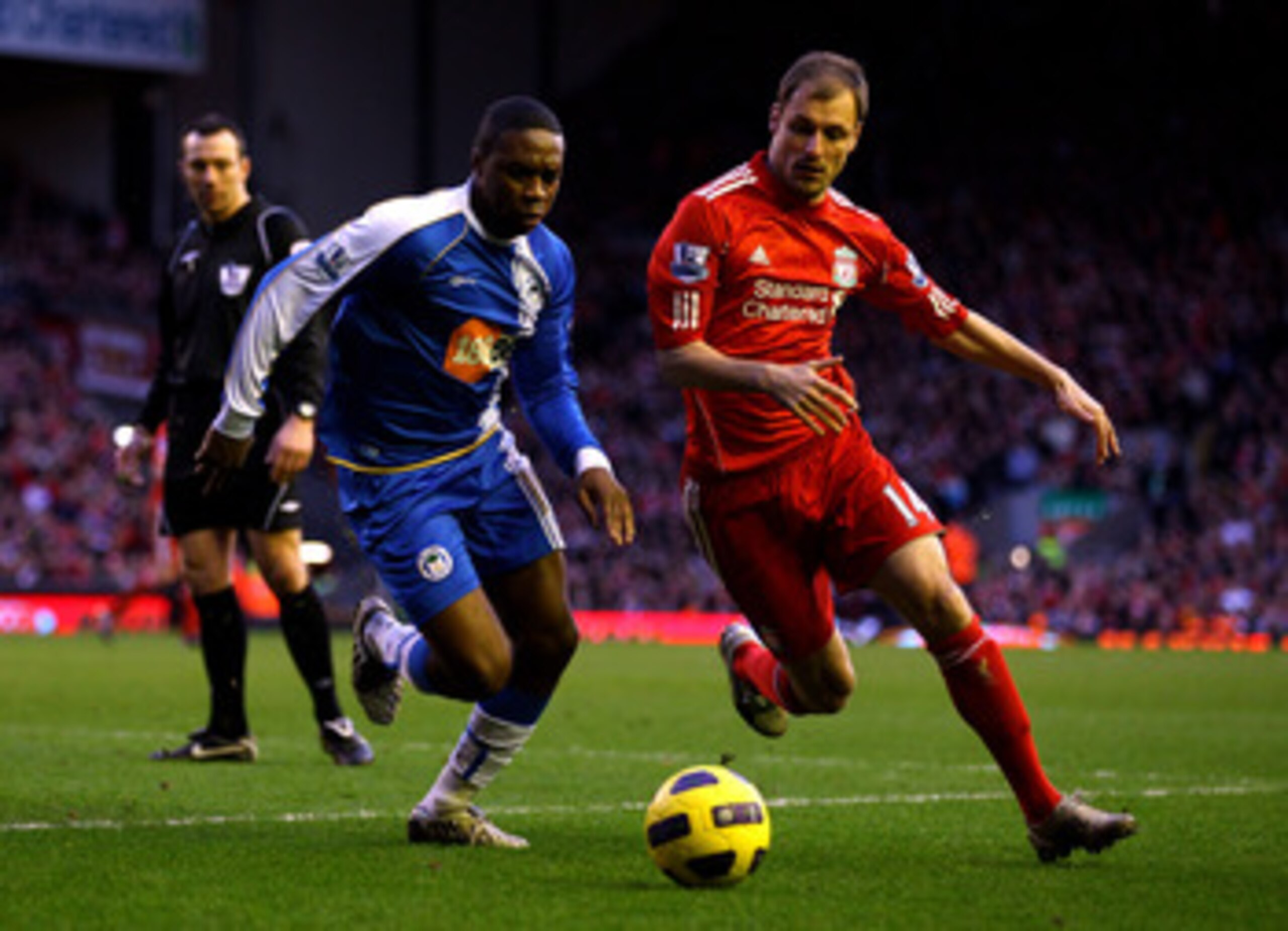 LIVERPOOL, ENGLAND - FEBRUARY 12: Charles N' Zogbia of Wigan Athletic competes with Milan Jovanovic of Liverpool during the Barclays Premier League match between Liverpool and Wigan Athletic at Anfield on February 12, 2011 in Liverpool, England. (Photo b LIVERPOOL, ENGLAND - FEBRUARY 12: Charles N' Zogbia of Wigan Athletic competes with Milan Jovanovic of Liverpool during the Barclays Premier League match between Liverpool and Wigan Athletic at Anfield on February 12, 2011 in Liverpool, England. (Photo b