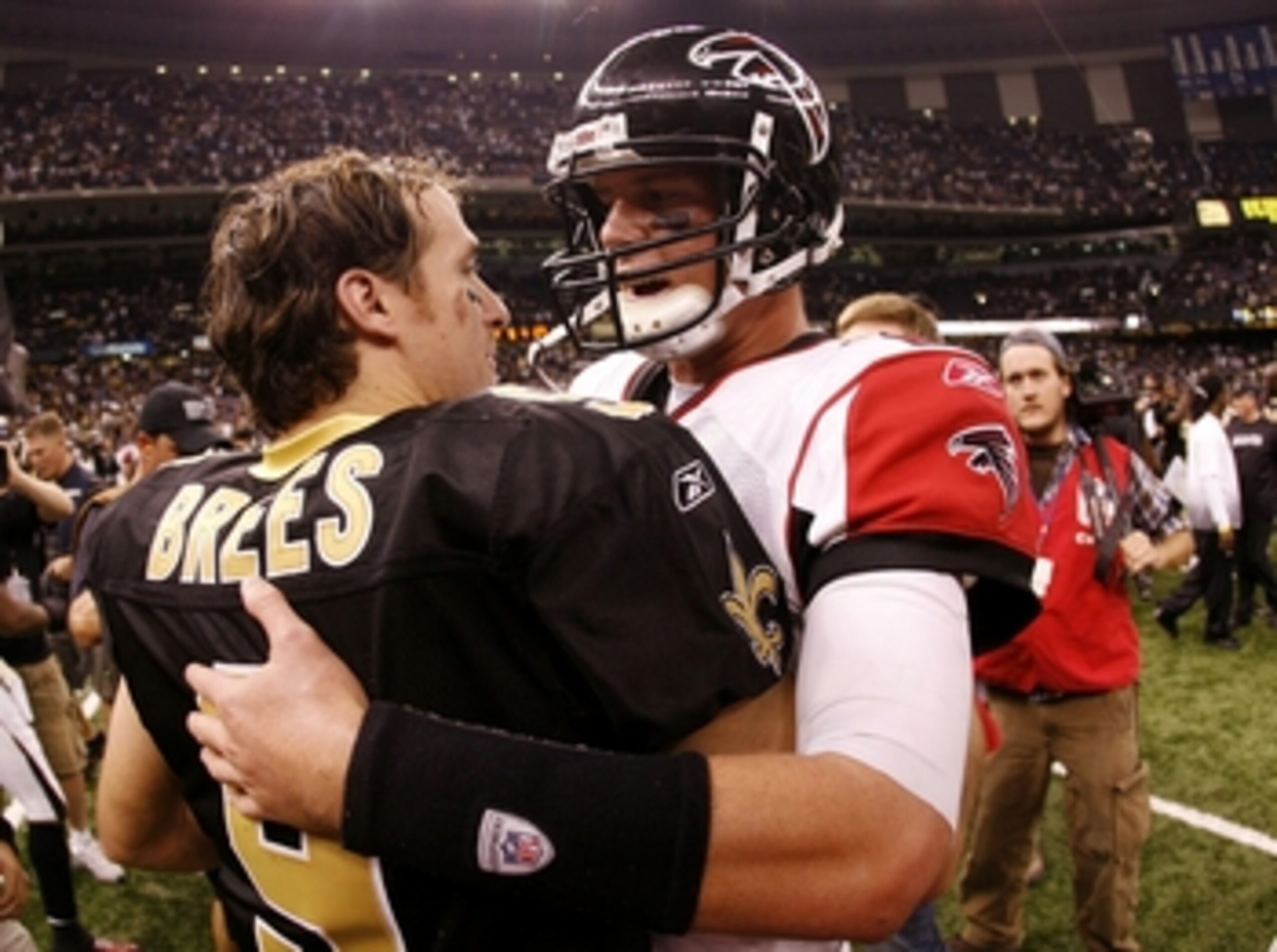 NEW ORLEANS - NOVEMBER 2: Quarterback Drew Brees #9 of the New Orleans Saints greets quarterback Matt Ryan #2 of the Atlanta Falcons after the Saints 35-27 victory in the game at the Louisiana Superdome on November 2, 2009 in New Orleans, Louisiana. (Pho NEW ORLEANS - NOVEMBER 2: Quarterback Drew Brees #9 of the New Orleans Saints greets quarterback Matt Ryan #2 of the Atlanta Falcons after the Saints 35-27 victory in the game at the Louisiana Superdome on November 2, 2009 in New Orleans, Louisiana. (Pho