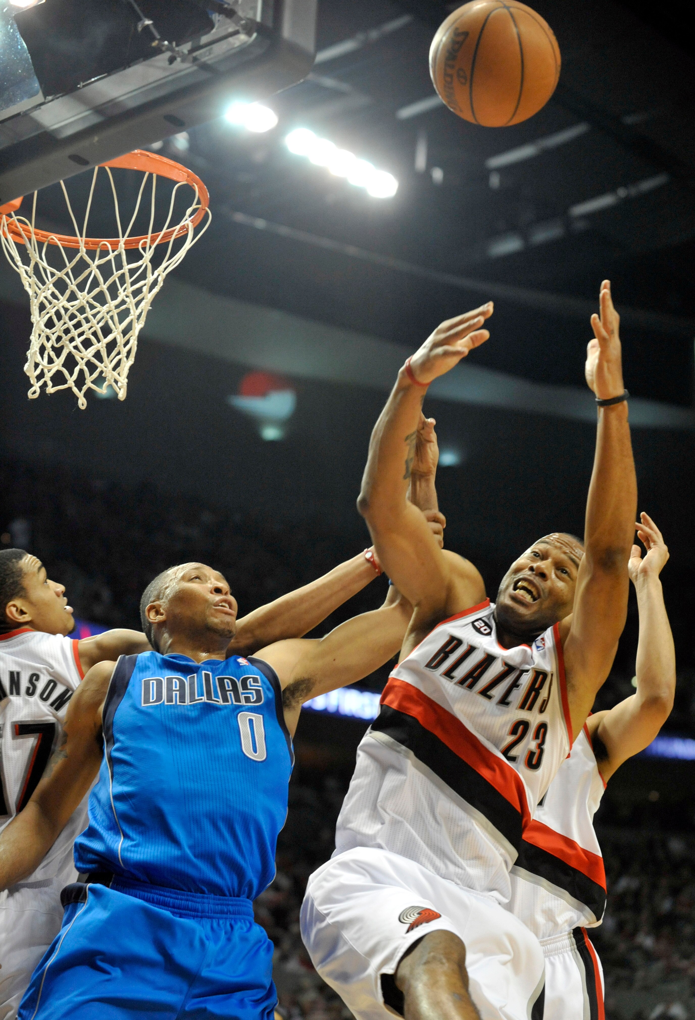 PORTLAND, OR - APRIL 28: Shawn Marion #0 of the Dallas Mavericks battles for a rebound with Marcus Camby #23 of the Portland Trail Blazers during the first quarter of Game Six of the Western Conference Quartefinals in the 2011 NBA Playsoffs on April 28, 2