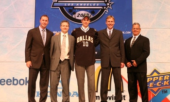 LOS ANGELES, CA - JUNE 25:  Jack Campbell, drafted 11th overall by the Dallas Stars, poses on stage with team personnel during the 2010 NHL Entry Draft at Staples Center on June 25, 2010 in Los Angeles, California.  (Photo by Bruce Bennett/Getty Images)