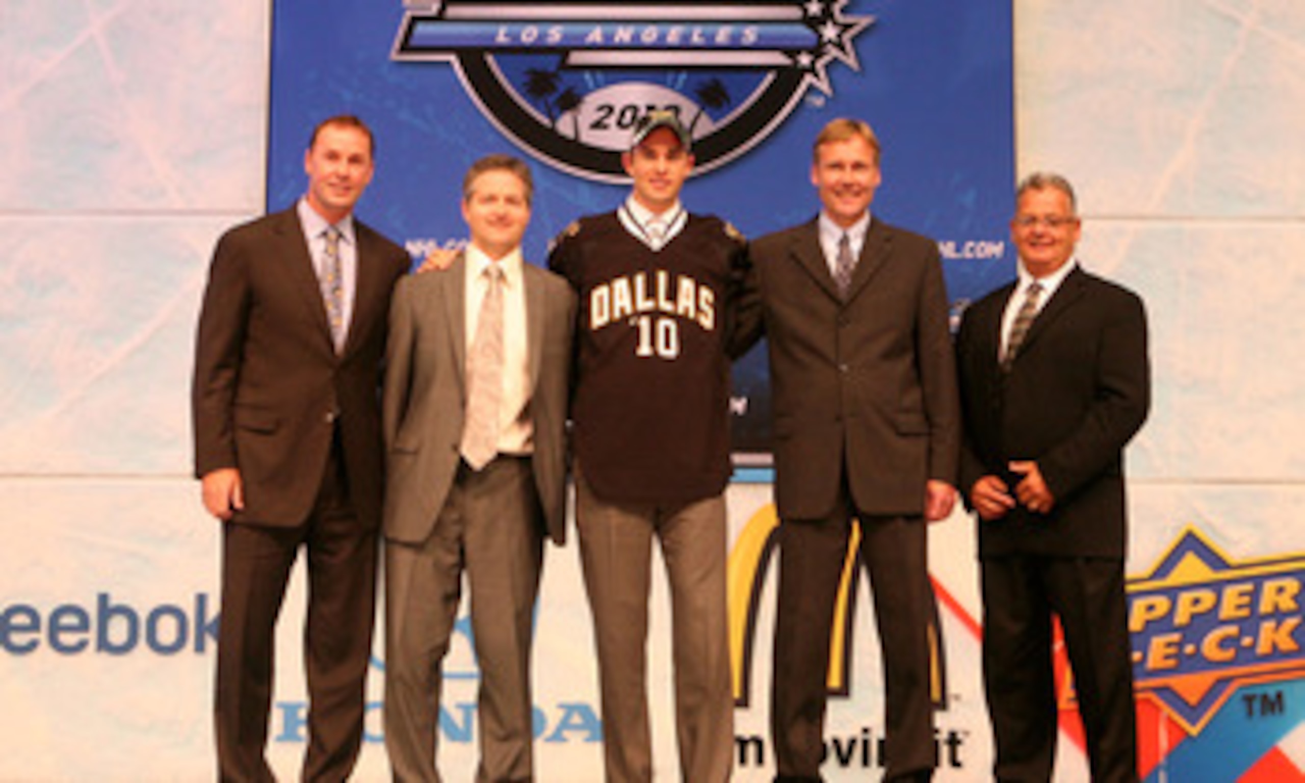 LOS ANGELES, CA - JUNE 25:  Jack Campbell, drafted 11th overall by the Dallas Stars, poses on stage with team personnel during the 2010 NHL Entry Draft at Staples Center on June 25, 2010 in Los Angeles, California.  (Photo by Bruce Bennett/Getty Images)