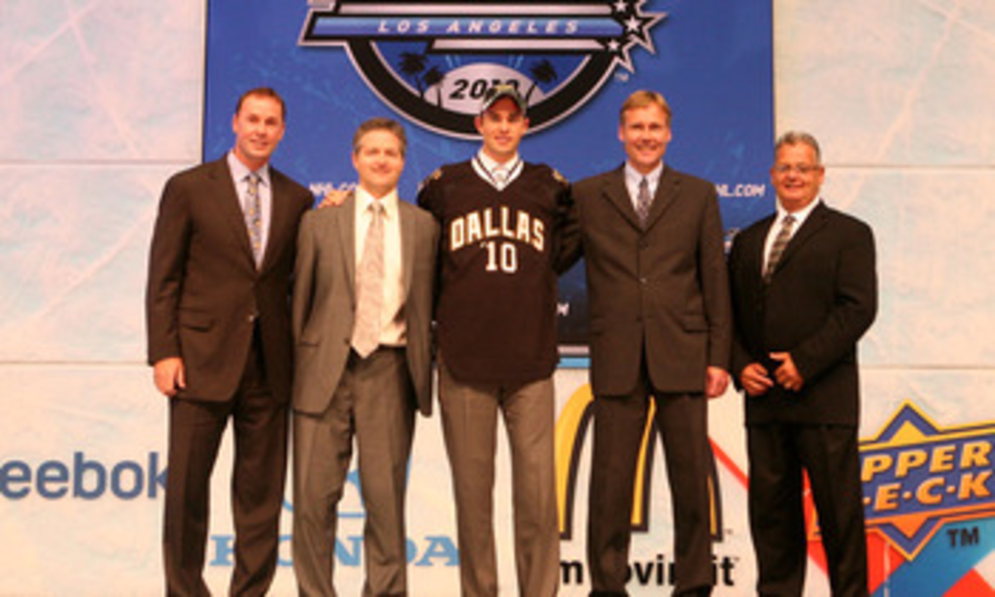 LOS ANGELES, CA - JUNE 25:  Jack Campbell, drafted 11th overall by the Dallas Stars, poses on stage with team personnel during the 2010 NHL Entry Draft at Staples Center on June 25, 2010 in Los Angeles, California.  (Photo by Bruce Bennett/Getty Images)