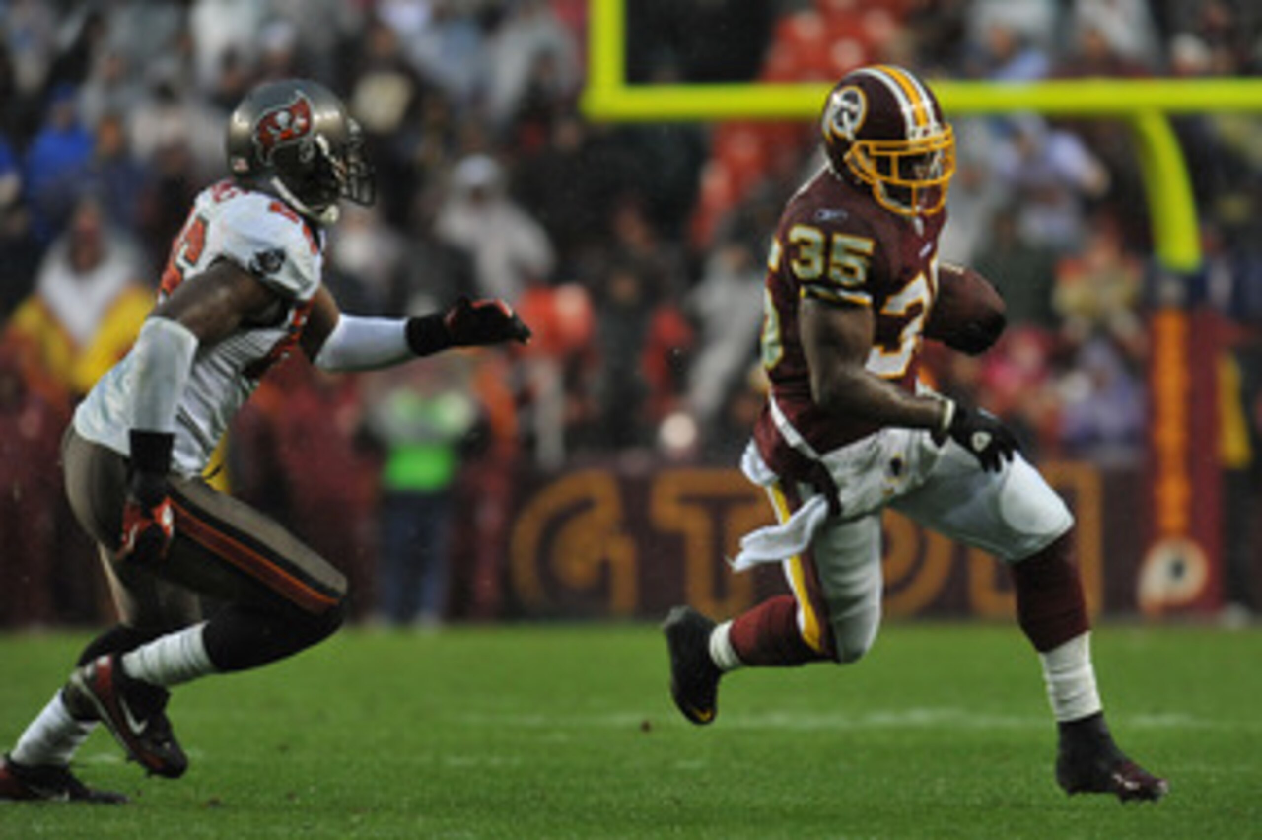 LANDOVER, MD - DECEMBER 12:  Keiland Williams #35 of the Washington Redskins runs the ball against the Tampa Bay Buccaneers  at FedExField on December 12, 2010 in Landover, Maryland. The Buccaneers defeated the Redskins 17-16. (Photo by Larry French/Getty