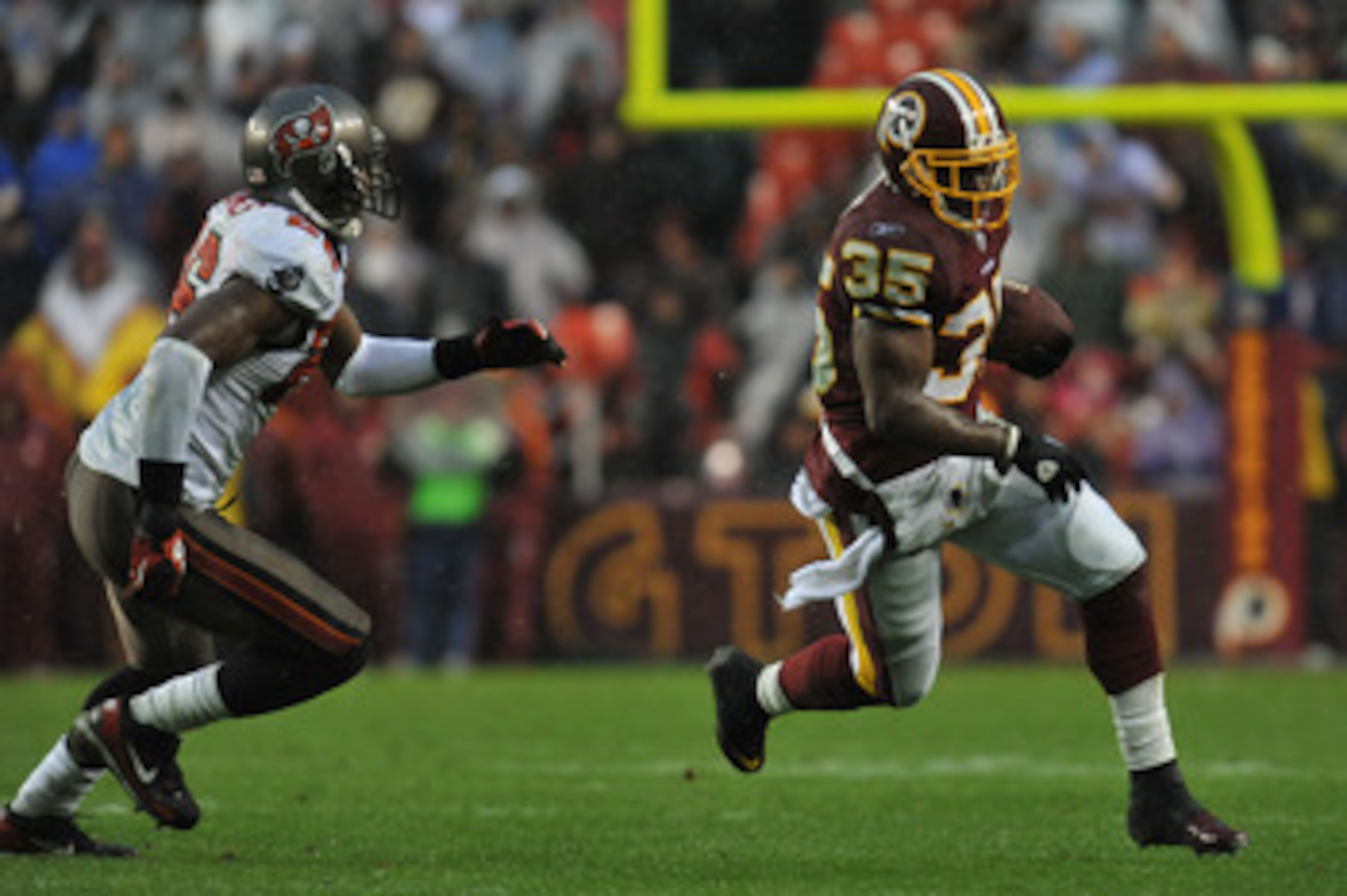LANDOVER, MD - DECEMBER 12:  Keiland Williams #35 of the Washington Redskins runs the ball against the Tampa Bay Buccaneers  at FedExField on December 12, 2010 in Landover, Maryland. The Buccaneers defeated the Redskins 17-16. (Photo by Larry French/Getty