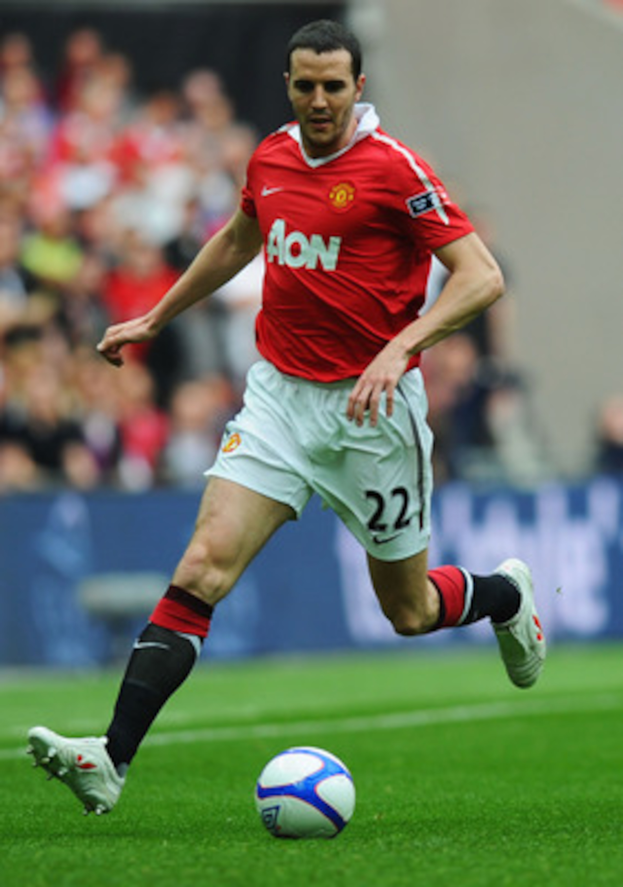 LONDON, ENGLAND - APRIL 16:  John O'Shea of Manchester United  on the ball during the FA Cup sponsored by E.ON semi final match between Manchester City and Manchester United at Wembley Stadium on April 16, 2011 in London, England.  (Photo by Mike Hewitt/G