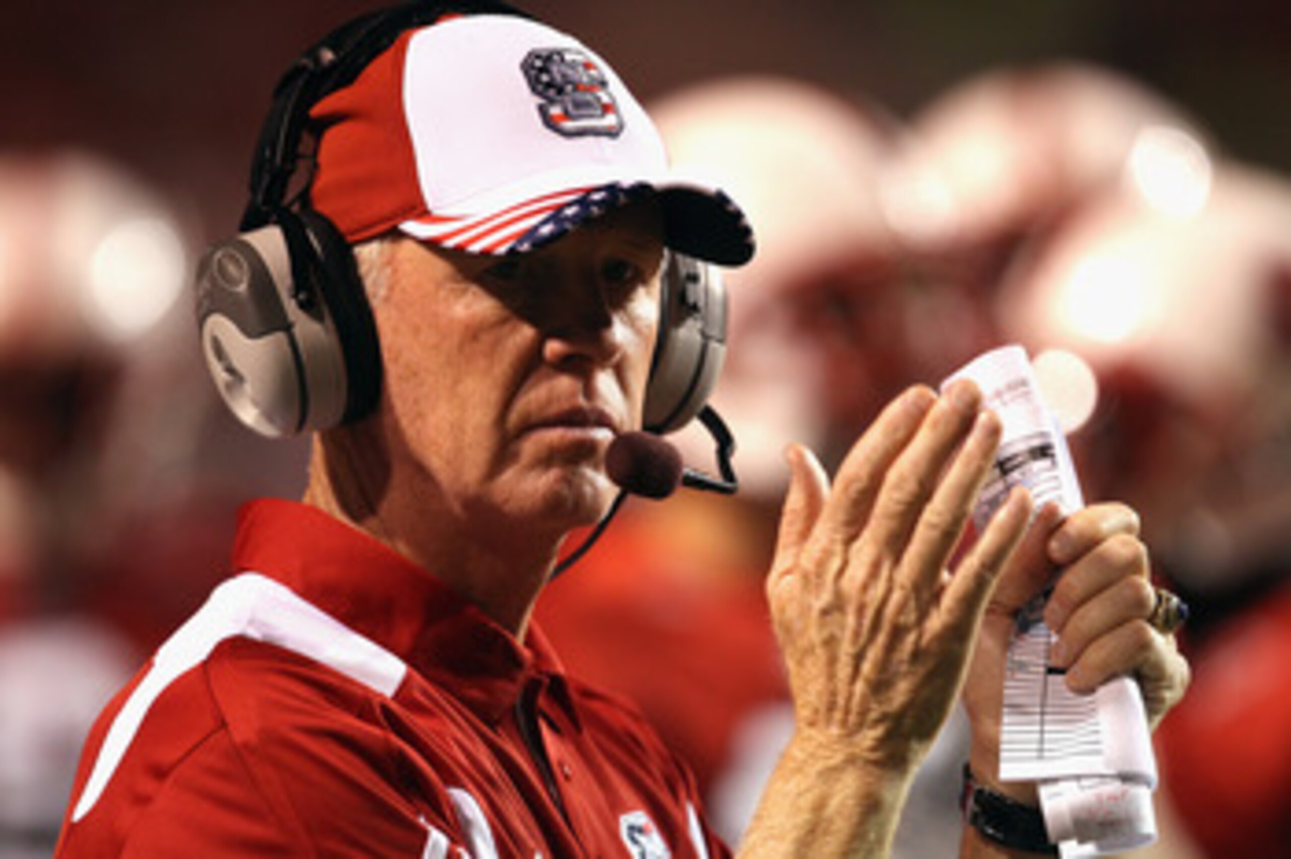 RALEIGH, NC - SEPTEMBER 16:  Head coach Tom O'Brien of the North Carolina State Wolfpack cheers on his team against the Cincinnati Bearcats during their game at Carter-Finley Stadium on September 16, 2010 in Raleigh, North Carolina.  (Photo by Streeter Le