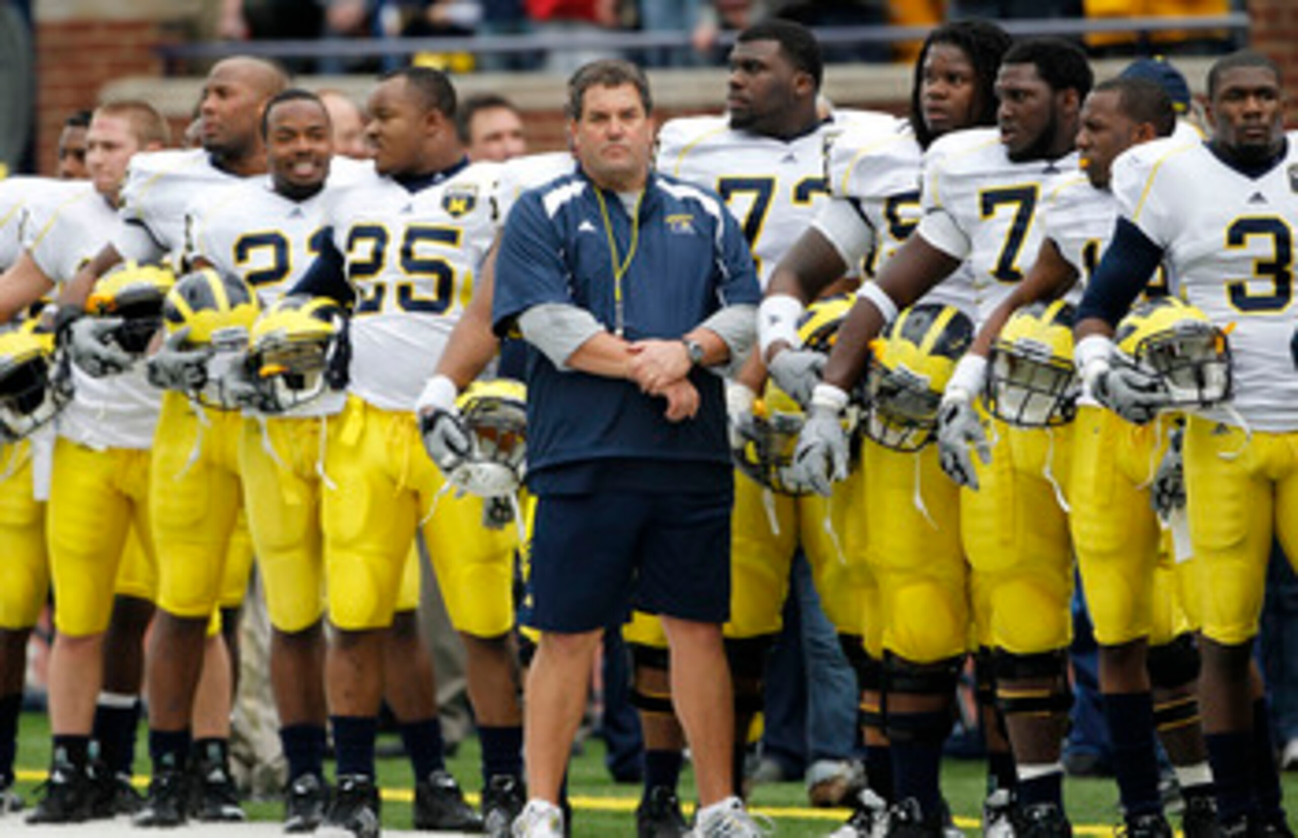 ANN ARBOR, MI - APRIL 16:  Head football coach Brady Hoke stands with his team prior to the start of the annual Spring Game at Michigan Stadium on April 16, 2011 in Ann Arbor, Michigan.  (Photo by Leon Halip/Getty Images)