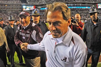 TUSCALOOSA, AL - NOVEMBER 13: Coach Dan Mullen of the Mississippi State Bulldogs shakes hands with coach Nick Saban of the Alabama Crimson Tide November 13, 2010 at Bryant-Denny Stadium in Tuscaloosa, Alabama.  (Photo by Al Messerschmidt/Getty Images)