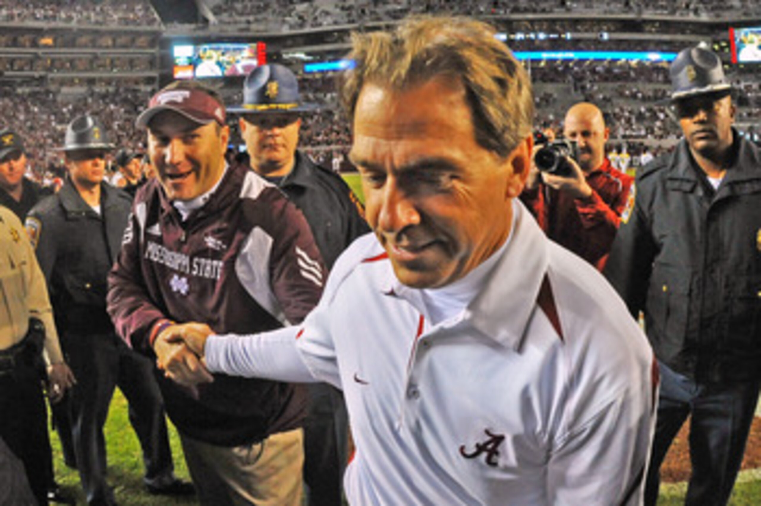 TUSCALOOSA, AL - NOVEMBER 13: Coach Dan Mullen of the Mississippi State Bulldogs shakes hands with coach Nick Saban of the Alabama Crimson Tide November 13, 2010 at Bryant-Denny Stadium in Tuscaloosa, Alabama. (Photo by Al Messerschmidt/Getty Images) TUSCALOOSA, AL - NOVEMBER 13: Coach Dan Mullen of the Mississippi State Bulldogs shakes hands with coach Nick Saban of the Alabama Crimson Tide November 13, 2010 at Bryant-Denny Stadium in Tuscaloosa, Alabama. (Photo by Al Messerschmidt/Getty Images)