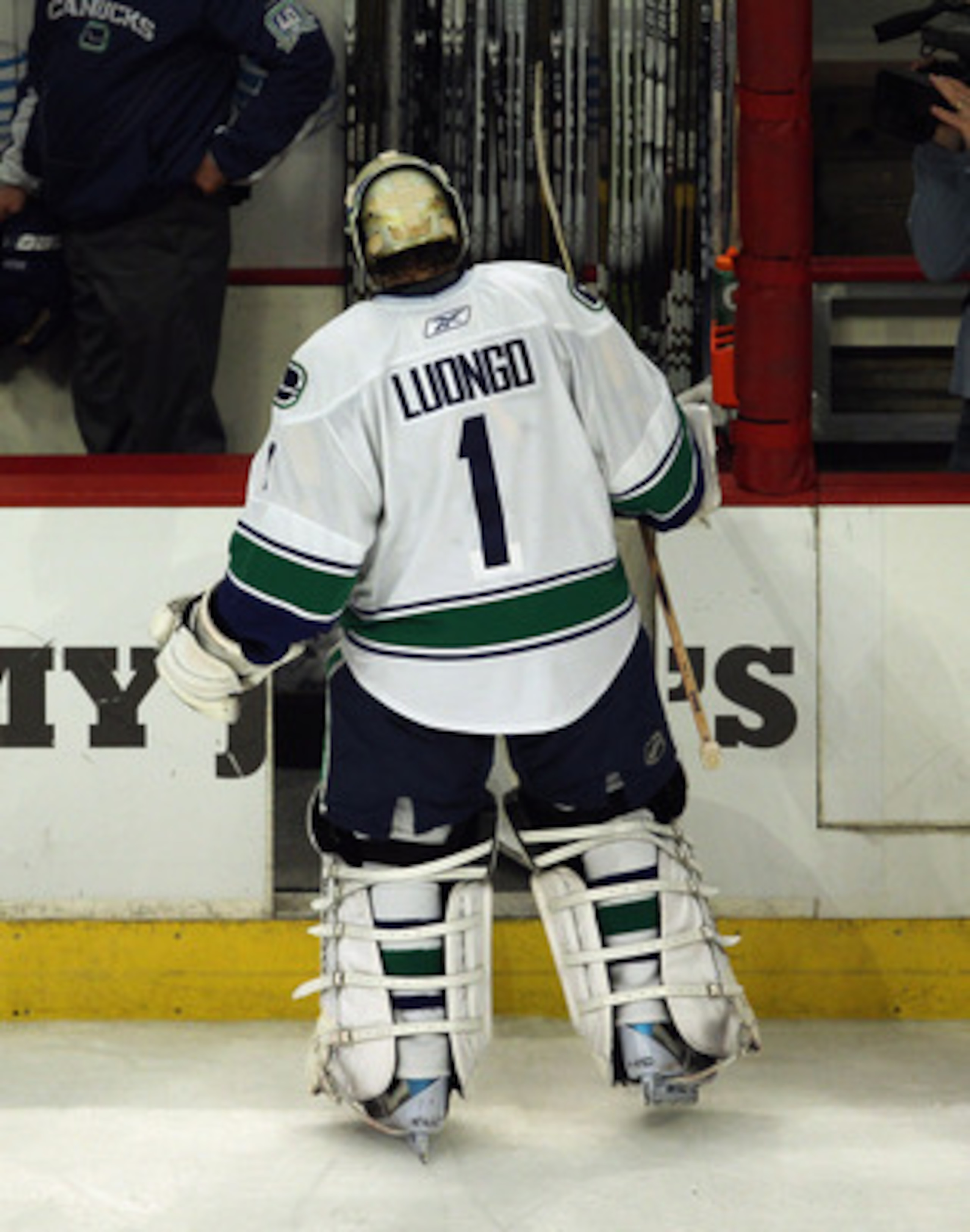 CHICAGO, IL - APRIL 24: Roberto Luongo #1 of the Vancouver Canucks skates off the ice after giving up the winning goal against the Chicago Blackhawks in Game Six of the Western Conference Quarterfinals during the 2011 NHL Stanley Cup Playoffs at the Unite