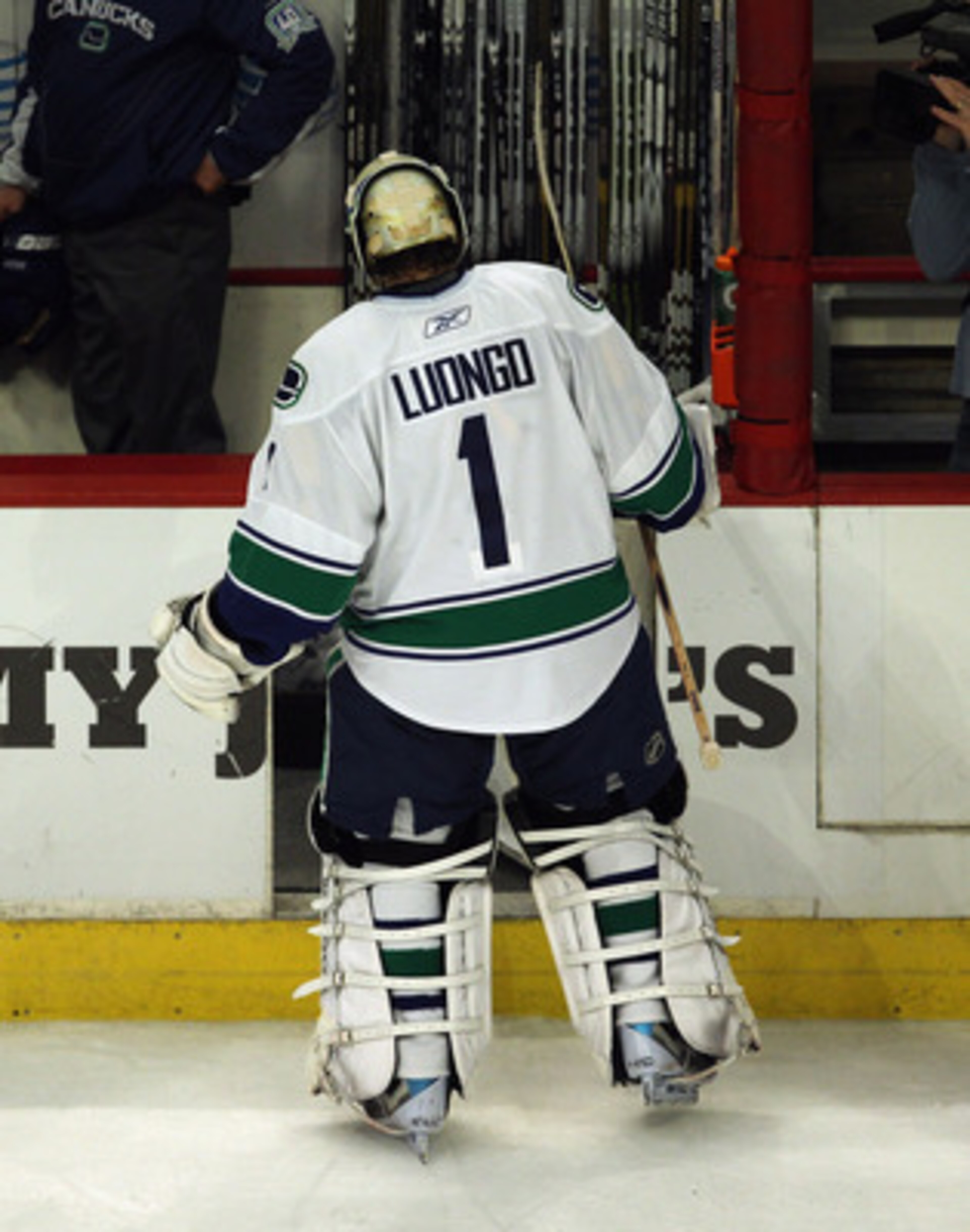CHICAGO, IL - APRIL 24: Roberto Luongo #1 of the Vancouver Canucks skates off the ice after giving up the winning goal against the Chicago Blackhawks in Game Six of the Western Conference Quarterfinals during the 2011 NHL Stanley Cup Playoffs at the Unite