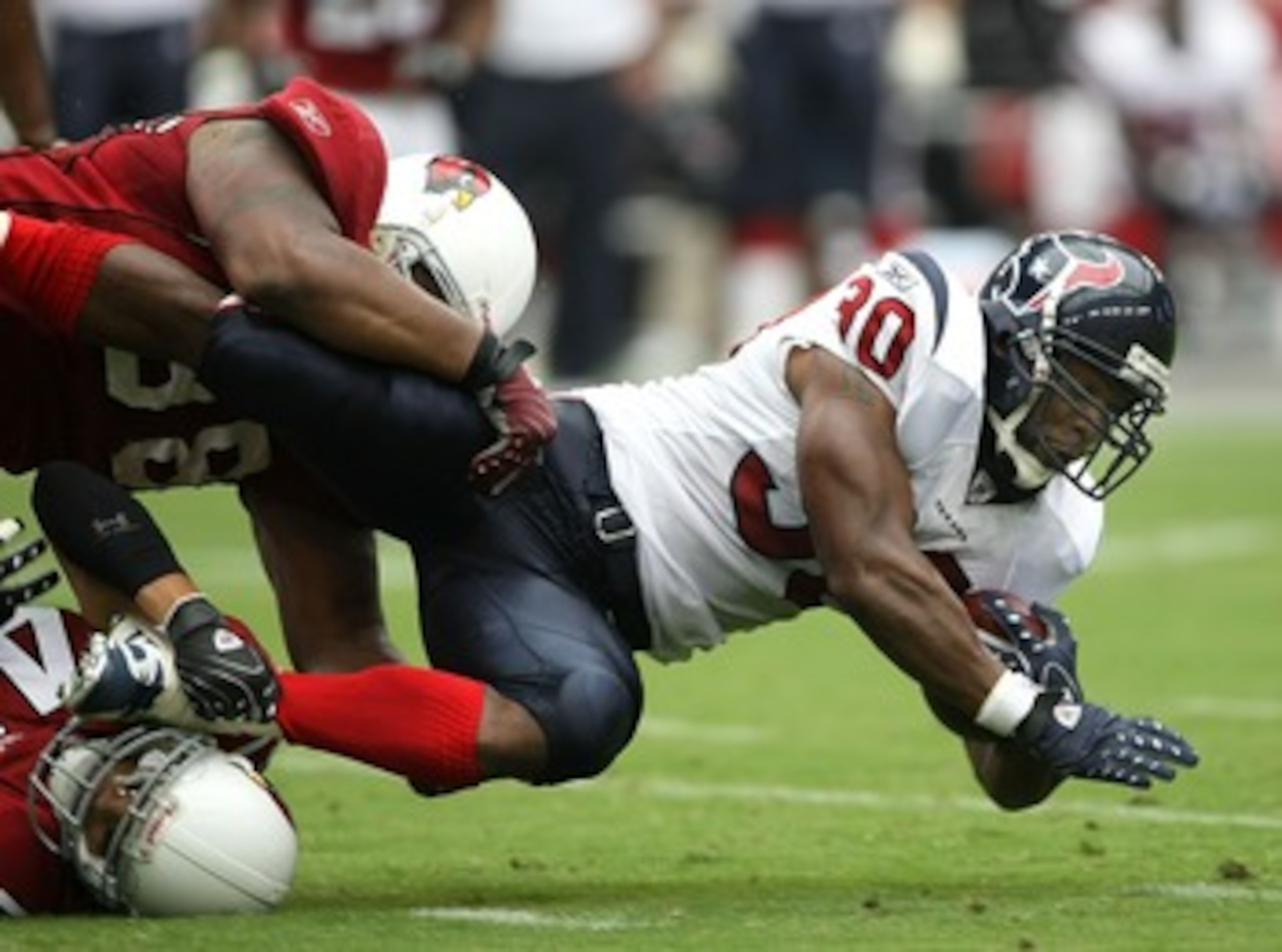 GLENDALE, AZ - AUGUST 18:  Running back Ahman Green #30 of the Houston Texans carries the ball against the Arizona Cardinals during their NFL preseason game at University of Phoenix Stadium August 18, 2007 in Glendale, Arizona.  (Photo by Stephen Dunn/Get