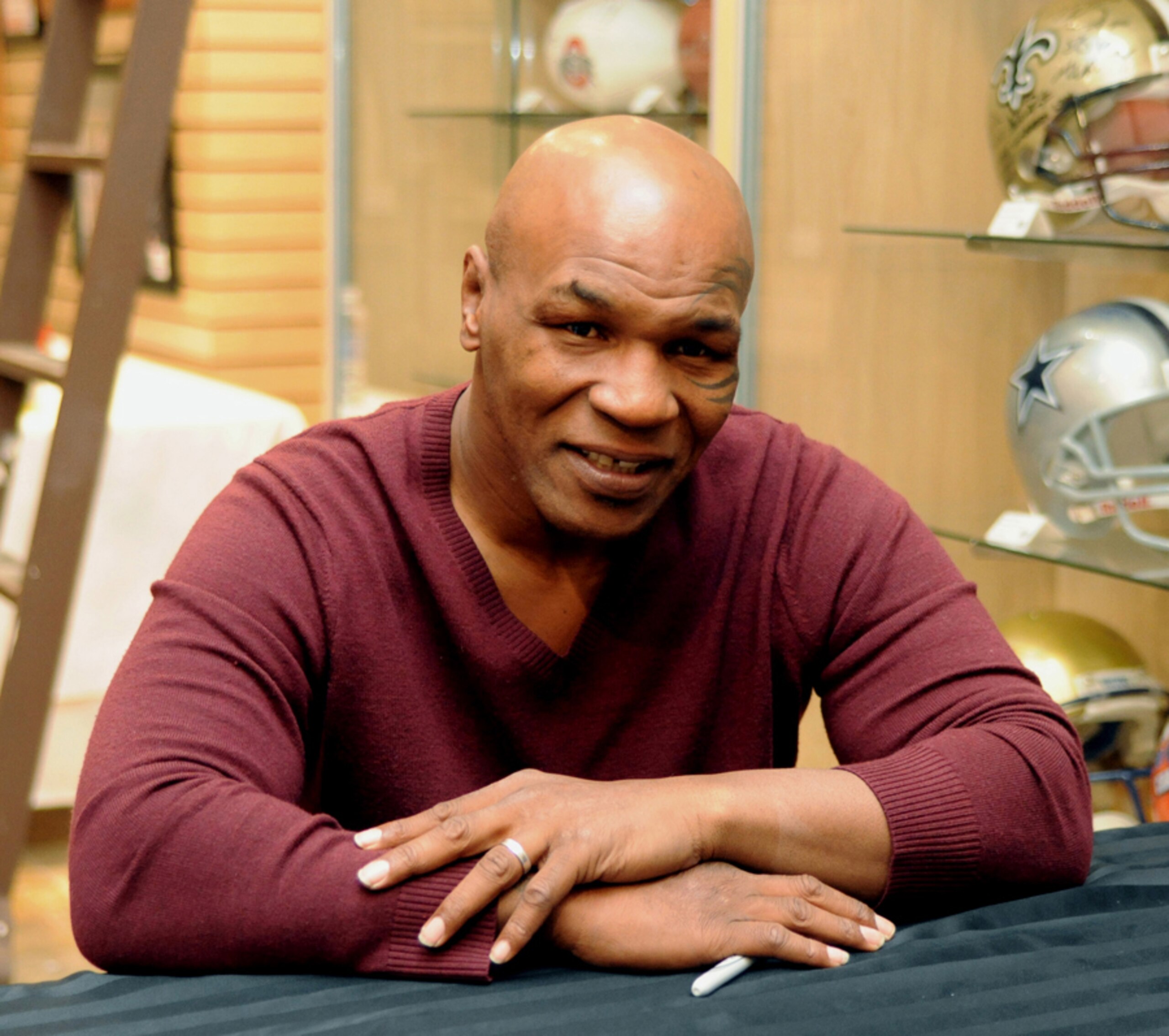 LAS VEGAS - FEBRUARY 4: In this handout photo provided by Las Vegas News Bureau, former heavyweight boxing champion Mike Tyson attends an autograph-signing session in the Miracle Mile Shops at Planet Hollywood Resort & Casino on February 4, 2011 in Las LAS VEGAS - FEBRUARY 4: In this handout photo provided by Las Vegas News Bureau, former heavyweight boxing champion Mike Tyson attends an autograph-signing session in the Miracle Mile Shops at Planet Hollywood Resort & Casino on February 4, 2011 in Las